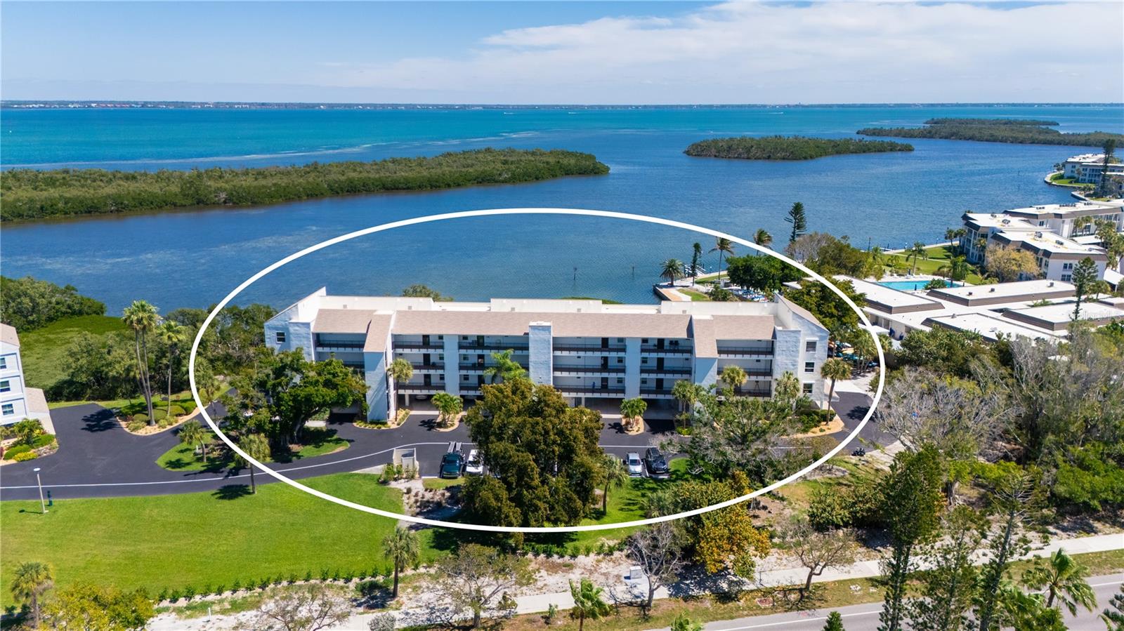 GORGEOUS BAYFRONT PENTHOUSE VIEWS--RARE TOP FLOOR OPPORTUNITY!! Nestled in the heart of a vibrant Longboat Key Community, this stunning two-bedroom, two-bathroom condo offers unparralled water views of Sarasota bay, creating a great backdrop for both sunrises and sunsets. Step inside and be captivated by the breathtaking scenery and spacious design that blends coastal living with sophistication. Beautifully renovated with new floor to ceiling hurricane windows, this condo seamlessly integrates the living and dining areas with an open kitchen featuring stone countertops, custom cabinets and new Stainless steel appliances. The light-filled primary bedroom boasts two closets, one being a walkin complete with built in ample storage. Both bathrooms have been tastefully renovated, offering a spa-like ambiance that invites relaxation. Take in manatee and dolphin viewing from the expansive Florida Room or relax in style looking out the huge picture window as the sun rises over the bay. This professionally managed, pet friendly community offers an array of amenities including 26 acres of landscaped ground, 2 marinas, 2 heated pools, tennis courts, pickle ball courts, state-of-the art Fitness Center, library and Community Clubhouse. Take advantage of the Deeded Beach Access just steps away. With its prime location, stunning views and extensive amenities, this property represents a rare opportunity to embrace the best of waterfront living.