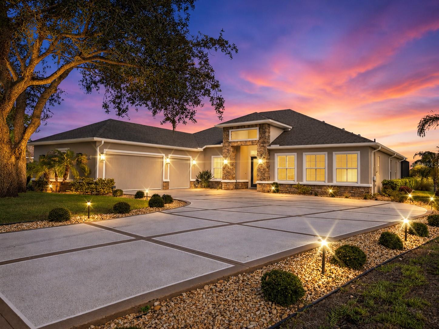 Experience Unparalleled Luxury Country Club Living in Glen Lakes Golf & Country Club Welcome to this custom-built luxury home, completed in 2022 and thoughtfully designed with exceptional craftsmanship, premium finishes, and luxurious upgrades throughout. Perfectly positioned on one of the most desirable homesites on a chain of lakes with breathtaking water views and no future development behind the property, this residence offers 3,156 square feet of living space and 4,524 total square feet of thoughtfully designed luxury living.This beautifully appointed 4-bedroom, 3-bathroom split floor plan offers elegance, comfort, and privacy, along with a separate executive office ideal for working from home, managing a business, or enjoying a quiet retreat.From the moment you arrive, you’ll appreciate the impressive curb appeal featuring a turn-around driveway with parking for up to six vehicles, a true three-car garage, and professionally landscaped grounds.Step inside through the grand foyer into soaring ceilings, tray ceilings, abundant natural light, expansive windows, and refined architectural details. The open-concept design seamlessly connects the formal living room, executive office, breakfast nook, and gourmet kitchen, creating an ideal flow for entertaining and everyday living.The main living area is enhanced by an entire wall of hurricane-rated pocket sliding glass doors, seamlessly blending indoor and outdoor living while showcasing breathtaking water views, filling the home with natural light, and creating a true resort-style flow to the lanai.The chef’s kitchen features an oversized center island, Bordeaux premium natural stone countertops, custom solid wood cabinetry, spacious pantry, built-in refrigerator, separate ice maker, separate convection oven, built-in microwave, stainless steel appliances, and exceptional storage.Luxury finishes include porcelain tile flooring, 6-inch crown molding, 8-foot grand doors, designer lighting, ceiling fans, and refined craftsmanship throughout.The oversized primary suite offers peaceful water views, a sitting area, and a spa-inspired bath with dual vanities, soaking tub, oversized walk-in shower, linen storage, and two oversized walk-in closets.Three additional bedrooms provide comfort and privacy with access to two full bathrooms.Outdoor living is exceptional with a screened lanai featuring travertine decking, saltwater pool, heated spa, and space for an outdoor kitchen. Enjoy serene water views, mature landscaping, and abundant wildlife in a private setting perfect for entertaining or relaxing. Additional features include a private well, double-pane windows and doors, spacious laundry room with custom cabinetry, and generous storage throughout. Located in a premier gated golf community, residents enjoy championship golf and resort-style amenities. Conveniently located near Weeki Wachee Springs State Park, Pine Island Beach, shopping, dining, medical facilities, and approximately 45 minutes from Tampa International Airport. This rare luxury estate combines timeless elegance, modern craftsmanship, waterfront living, and resort-style amenities. Schedule your private showing today with Christina Green, Bridge Point Business & Real Estate Advisors. Additional features and upgrades available upon request.
