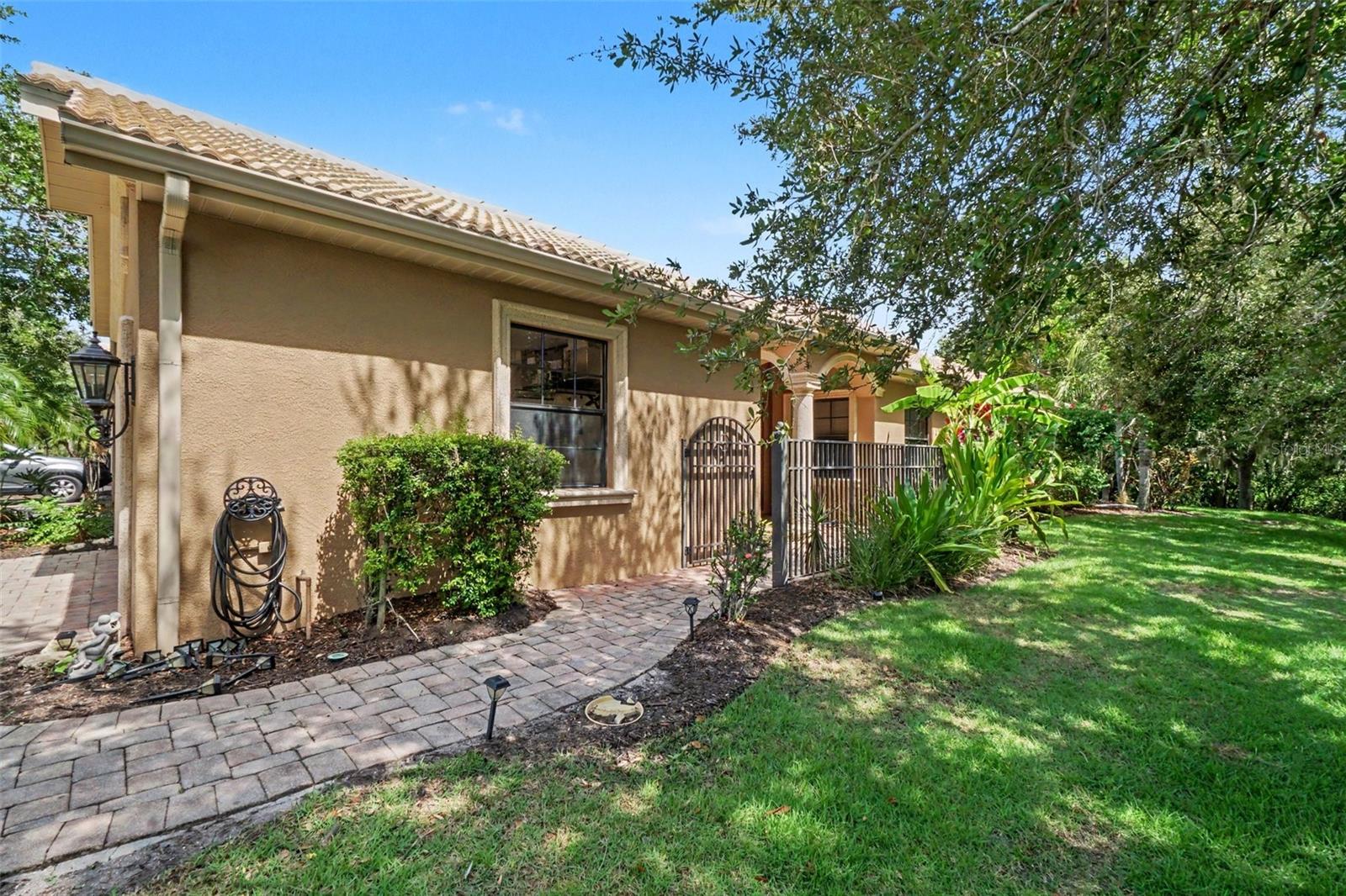 Welcome to the gated community of Bougainvillea Place! This immaculate home offers the ultimate maintenance-free Florida lifestyle. Enjoy total peace of mind with a brand-new HVAC system installed June 2026! The low HOA fee includes cable, grounds/exterior maintenance, pest control, a community pool, fitness center, and private roads. Inside, find a bright, open layout perfect for modern living. Truly turnkey and minutes from shopping and dining. Schedule your tour today!