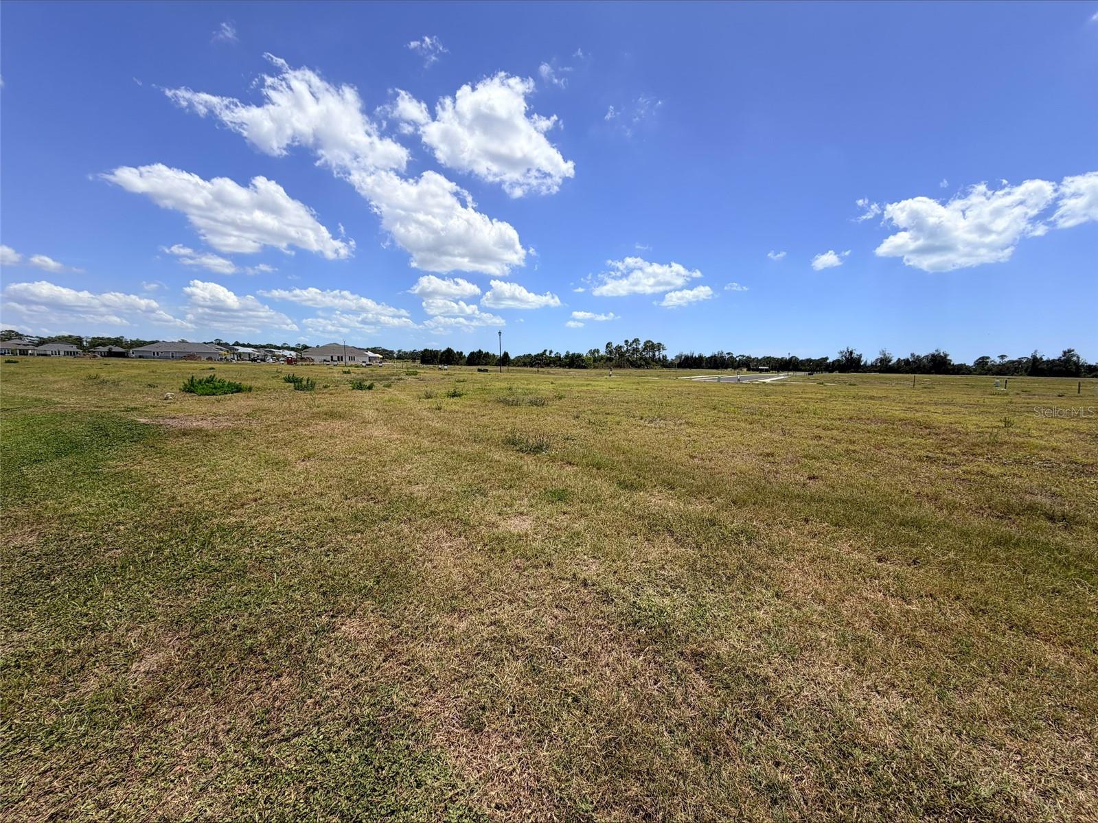 Vacant lot available in Magnolia Bay South Phase 1.