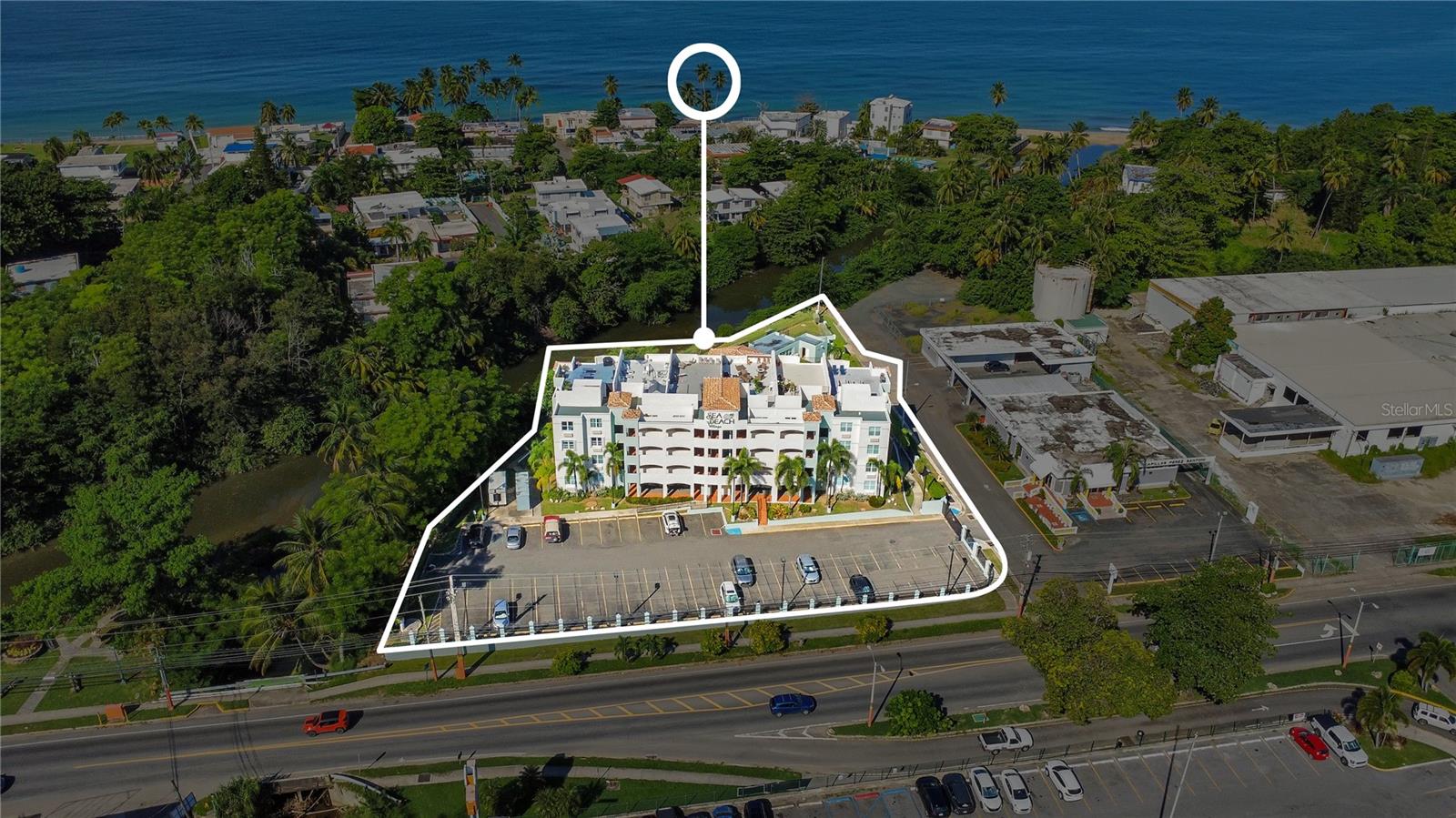Oceanview penthouse with private rooftop terrace in the desirable Sea Beach Village community of Rincón. Conveniently located to beaches, surf breaks, downtown Rincón, restaurants, and shops. This 3-bedroom, 2.5-bathroom residence is a unique find, as there are limited 3-bedroom condominium units available in Rincón, especially in such a prime location.
Offering approximately 1,375 sq. ft. of interior living space, plus additional private rooftop terrace area, this turn-key condo blends comfort, functionality, and island living ambiance. Short-term rentals are allowed, making it an excellent investment opportunity, vacation home, or primary residence.
The unit features open living spaces filled with natural light, an equipped kitchen, and air conditioning throughout. A standout feature is the private rooftop terrace complete with a half bathroom and outdoor shower, ideal for entertaining or enjoying Rincón’s beautiful sunsets and coastal breezes. The property also includes a private storage room and two parking spaces for added convenience.
Community amenities include a shared pool, basketball court, and BBQ areas. Offered at $659,000.