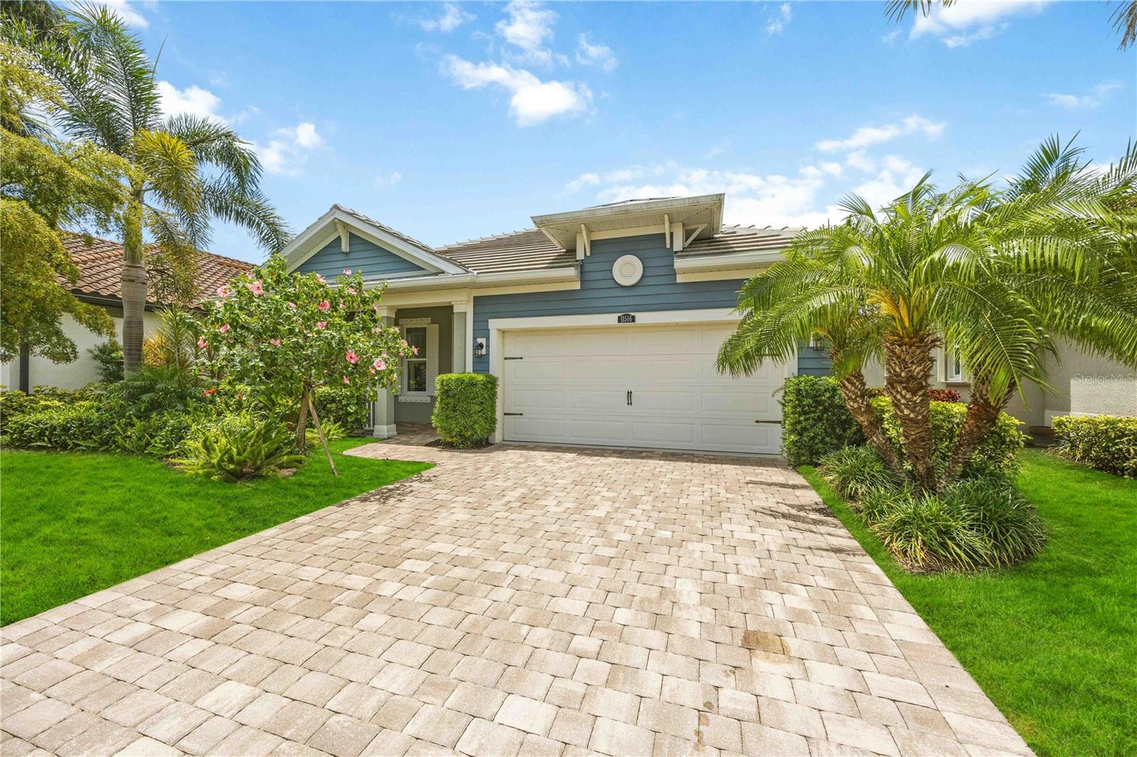 Welcome to one of the most desirable homesites in Renaissance at Wellen Park, offering unobstructed west-facing water views and unforgettable sunset backdrops. This beautifully maintained 3-bedroom, 2-bath residence with a flex room spans 1,936 sq ft and showcases a thoughtfully designed split floor plan that balances privacy with effortless flow.

From the moment you enter, natural light fills the living spaces, drawing your eye through to the expansive water views beyond. The heart of the home opens seamlessly to an extended covered lanai, creating the perfect setting for relaxing or entertaining while enjoying peaceful water vistas and vibrant evening skies.

The interior offers a clean, modern aesthetic with open-concept living and a versatile flex space ideal for a home office or den. A charming front porch enhances the home’s inviting curb appeal and provides a quiet place to start your day.

Positioned on a premium lot within a fully established, gated community, this home benefits from mature, established landscaping and a finished neighborhood setting with no ongoing construction—a rare advantage that adds both beauty and tranquility.

Renaissance at Wellen Park is an amenity-rich community featuring a resort-style pool, fitness center, tennis, pickleball, and a full calendar of social activities. Residents also enjoy direct access to a connected dog park, scenic walking paths, and a vibrant, active lifestyle—all with relatively low HOA fees.

Ideally located just minutes from Downtown Wellen, CoolToday Park, shopping, dining, and Gulf Coast beaches, this home delivers the best of Southwest Florida living.

A true opportunity to own a premium water-view property with exceptional sunset exposure in one of the area’s most sought-after communities.
