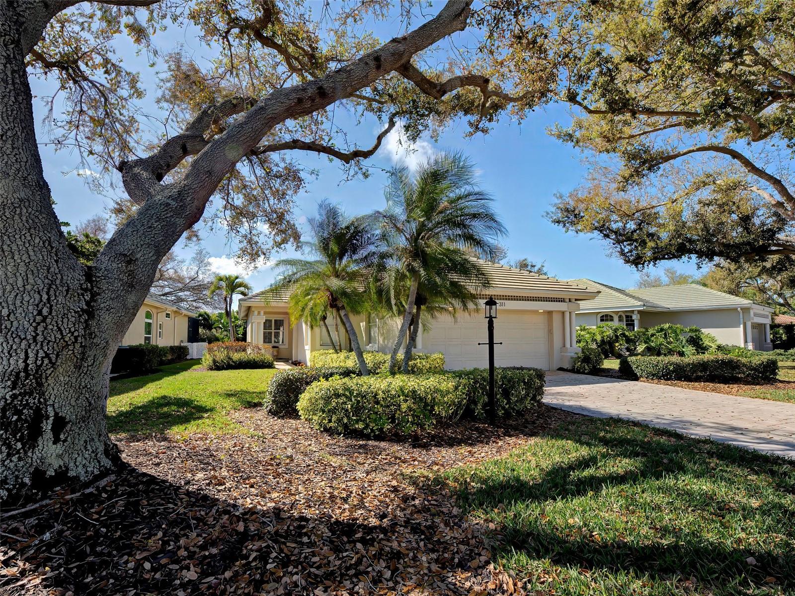 Here is your perfect 3 bed home just steps from the neighborhood pool and perfectly positioned with a view of the 14th tee. This lovely home offers an exceptional opportunity in exclusive Venice Golf & Country Club for easy Florida living.
You will immediately appreciate the meticulous care and updates throughout. The entire interior has recently been completely painted. Rich oak hardwood floors flow throughout the main living areas, complemented by crown molding and custom window valances in many of the rooms — a few of the finishing touches that elevate the entire space.

The beautifully updated kitchen features newer shaker-style cabinetry, a breakfast bar, a large center island, a large pantry, stunning granite countertops, and newer stainless steel appliances — ideal for both everyday living and entertaining. The floor plan and fresh paint provide a bright, light-filled, fresh feeling throughout the home.

The primary suite is a true retreat with sliders to the lanai and offers the ensuite remodeled bathroom showcasing a walk-in shower, soaking tub, and dual vanities. The guest bath has also been updated.

Major improvements provide peace of mind, including: brand-new hurricane-impact sliding glass doors and several new impact windows; roof replacement (2016); complete home replumbing; new Samsung Platinum Series washer & dryer (October 2023); new smart-technology water heater (November 2023); garage door operator, belt drive, and controllers replaced (2022); overhead tension springs replaced (2023). The garage includes a utility sink and built-in storage.

This home is truly move-in ready, and the association provides the lawn maintenance. Please ask about turnkey options.

Beyond your front door, enjoy the vibrant lifestyle of Venice Golf & Country Club. This private, member-owned community offers an 18-hole championship golf course, Har-Tru tennis courts, bocce, a Junior Olympic-sized pool and spa, and a state-of-the-art Wellness Center featuring advanced fitness equipment, onsite personal trainers, physical therapy, and massage services. The club offers formal and casual dining options with diverse cuisine selections and a newly expanded outdoor dining area, perfect for gathering with friends and family.

Ideally located close to shopping, dining, the beautiful beaches of Venice, and the thriving downtown area, this home is perfect for full-time or seasonal ownership.

Don’t miss this opportunity to take a look, it could be the one!