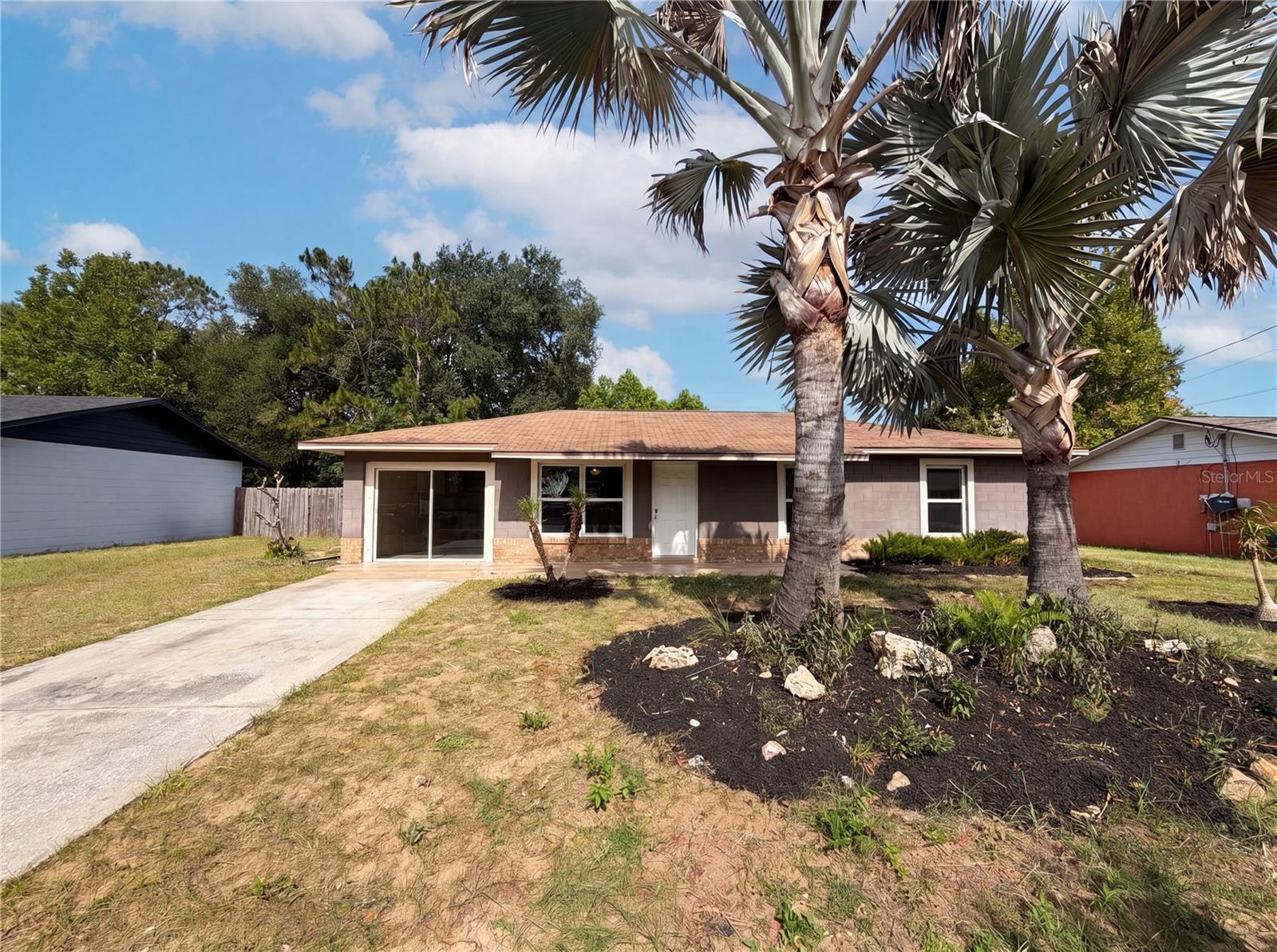Virtually Staged. Enjoy the best of small-town Florida living in this well-maintained 3-bedroom, 1.5-bath home located in Tavares, known as America's Seaplane City. Conveniently situated near downtown, waterfront dining, marinas, and Lake Dora, this property offers both comfort and accessibility.
Inside, you'll find a spacious living area filled with natural light, easy-care tile and laminate flooring, and a functional eat-in kitchen with plenty of potential to make it your own. The primary bedroom includes a private half bath, while two additional bedrooms provide flexibility for family, guests, or a home office.
A converted garage adds valuable bonus space that can serve as a workshop, creative studio, business workspace, or hobby room. Outdoors, a screened patio overlooks the fenced backyard, creating a great setting for entertaining, gardening, pets, or relaxing in the shade. A storage shed provides additional space for tools, equipment, and outdoor essentials.
With no HOA restrictions, there's room for your boat, motorcycle, or other recreational vehicles. Whether you're purchasing your first home, looking to downsize, or seeking a seasonal retreat, this property offers versatility, value, and a desirable location.