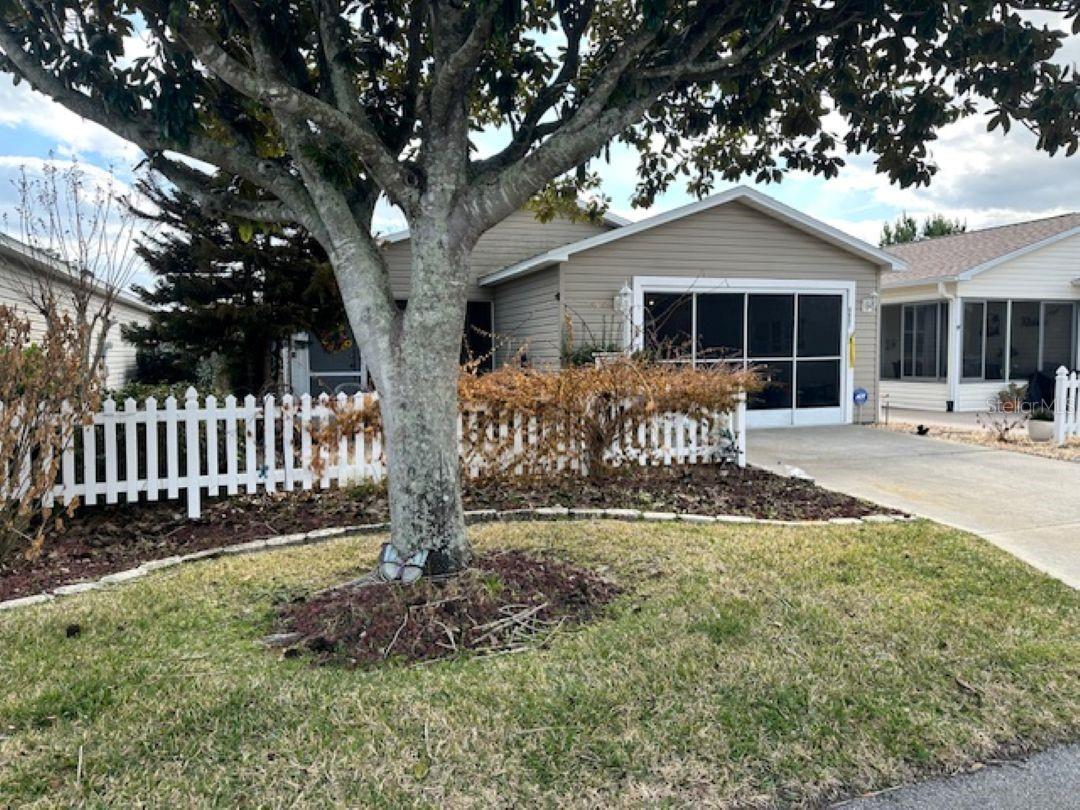 MAKE THIS YOUR OWN WITH THE FLOORS AND PAINT YOU DESIRE AND DESIGNED WITH YOUR COLORS AND TEXTURES. PRICE TO SELL!  NEW AC UNIT 2024, ROOF 2023, BATHROOM UPGRADED 2024, WATERHEATER 2025, HOME HAS AN AIR PURIFYER. GREAT LOCATION AT SPANISH SPRINGS, VILLA DE LEON this unit has 2 BEDROOMS 1Bathroom, "BOND IS PAID", patio villa home in the gated Village of Alhambra!. Excellent location - close to dining, medical, shopping, recreation - approx. 1 mile to the Savannah Center, approx. 2 miles to Spanish Springs Town Square. Recreation centers with pool, tennis, pickleball and more. Featuring a one and a half car garage (Golf Cart Parking), Spacious kitchen with large eat in bar top. Spacious living and dining rooms. Many Executive Golf Courses, and Championship Golf Courses Nearby. Easy Golf Cart Access to Shopping, Hospital, Spanish Springs Town Square and Lake Sumter Landing Town Square.