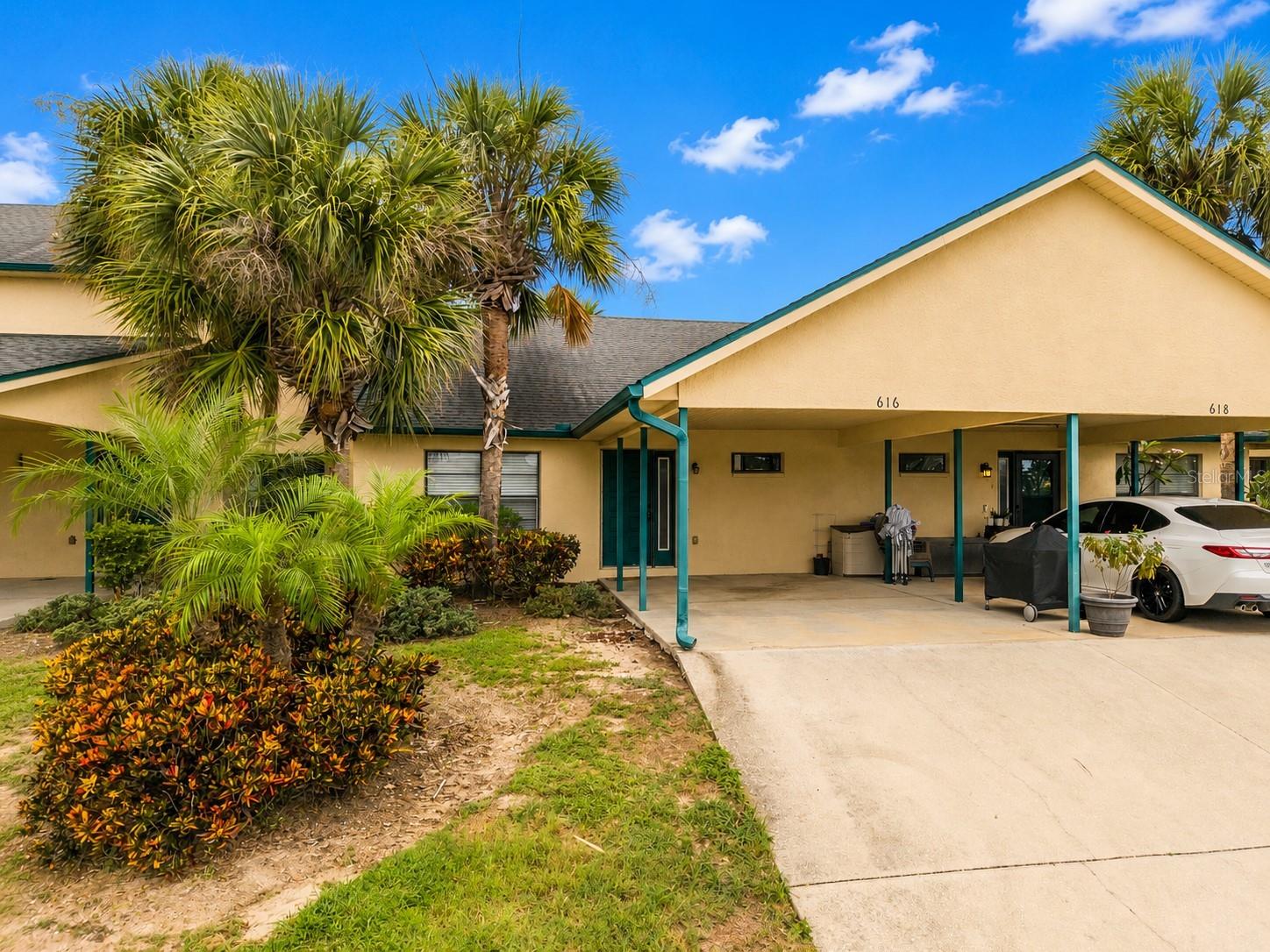 Wake up to beautiful canal views and easy Gulf access in the highly sought-after Yardarm community of Apollo Beach. This waterfront condo remained high and dry with no water intrusion from Hurricanes Milton or Helene, offering peace of mind along with an exceptional coastal lifestyle.Enjoy panoramic water views from your private lanai and take advantage of your deeded boat slip, which accommodates vessels up to 30 feet—perfect for boating enthusiasts looking to explore Tampa Bay, the Intracoastal Waterway, and the Gulf beyond.This well-maintained 2-bedroom, 2-bath residence features a spacious single-level floor plan designed to maximize natural light and showcase the waterfront setting. The kitchen has rich wood cabinetry, granite countertops, a breakfast bar, and a dining area that flows seamlessly into the inviting family room. Large windows and sliding glass doors bring the outdoors in, creating a bright and airy coastal atmosphere throughout the home.The generous primary suite serves as a private retreat with an en-suite bath, sitting area, and tranquil water views. A spacious guest bedroom and a nearby full bath provide comfort and privacy for family and visitors alike.  Conveniently located near shopping, marinas, and popular waterfront restaurants including Finn’s Dockside and Circles Waterfront, this property offers the perfect combination of comfort, convenience, and the relaxed Florida boating lifestyle.  A covered carport located directly in front of the unit provides convenient, protected parking.