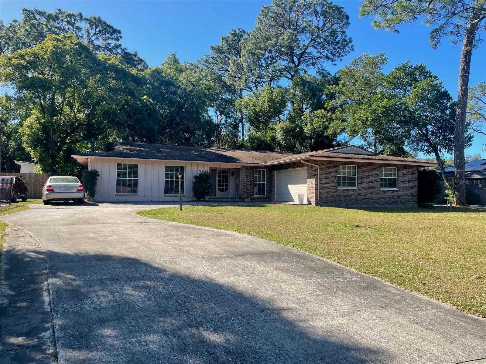 HUGE PRICE REDUCTION!!! Are you looking for lots of space? Better yet are you looking for lots of space on a 1/2 Acre lot?  Well, here it is.  Plenty of room for parking with the oversized driveway.  Enter the spacious home and see a formal sitting area overlooking the formal dining area.  Kitchen is equipped with lots of cupboards and counter tops.  There is a huge great room for all of the family gatherings.  Master is large and can accommodate a king size bed and furniture with a large double closet and your very own en-suite with bidet.  On the other side of the come you have 3 more bedrooms and 2 bathrooms one being a Jack and Jill bathroom.  2 of the bedrooms have walk-in closets.  Very large screened in porch overlooking a 1/2 acre of yard to run around in.  This home is located right around the corner from the University of South Florida and all your favorite restaurants. This beauty is waiting for a family to turn this home into a stunning masterpiece.  Priced with fix-up and remodeling in mind.