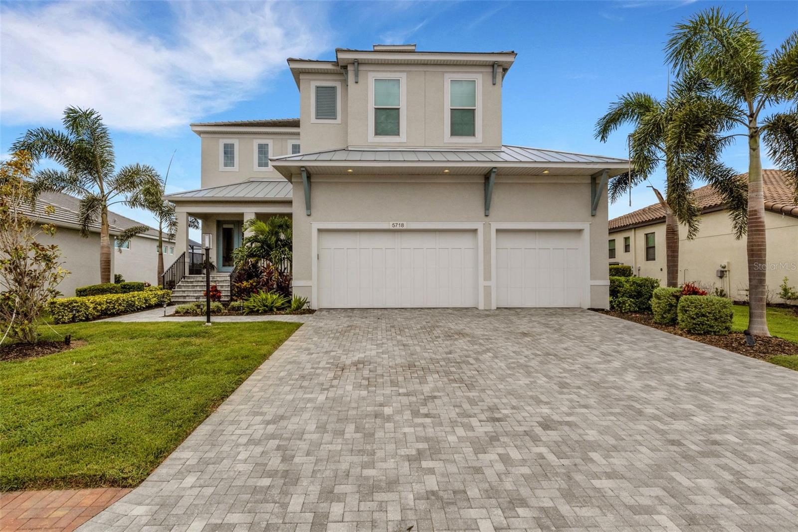 Discover resort-style living in this stunning 5-bedroom, 4-bath home located in the exclusive gated community of Legends Bay. Perfectly situated on a serene lakefront lot, this two-story residence offers the ultimate Florida lifestyle with its private pool, spacious outdoor living, and picturesque water views.

Just minutes from the world-renowned IMG Academy, this home is ideal for families, athletes, or investors seeking a luxury retreat close to education, sports, and recreation. Inside, you’ll find a bright, open layout with soaring ceilings, a chef’s kitchen designed for entertaining, and generous living spaces that flow seamlessly to the outdoor pool and lanai. The versatile floor plan includes multiple living areas and a private upstairs retreat, providing comfort and flexibility for guests or extended family.

Legends Bay is a premier gated community offering security, elegance, and convenience—just a short drive to Gulf beaches, downtown Sarasota, fine dining, golf, and Sarasota-Bradenton International Airport. Whether as a full-time residence, seasonal getaway, or investment, this property combines luxury, location, and lifestyle. The furniture is from Artefacto and can be purchased for $30,000.