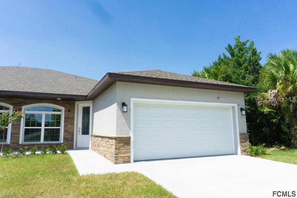 Welcome home to this beautiful and spacious 4-bedroom, 2-bath duplex located in the highly desirable Palm Harbor subdivision or Palm Coast. Built in 2019, this well maintained unit offers approximately 1,300 square feet of comfortable living space with an open concept layout, modern finishes, and plenty of natural light throughout. The kitchen features ample cabinet space, sleek countertops and a functional layout perfect for everyday living and entertaining. The primary suite includes a private bath and generous closet space, while the additional bedrooms provide flexibility for family, guests, or a home office. Enjoy tile flooring throughout the main living areas, indoor laundry hookups, and a private driveway. Conveniently located near shopping, restaurants, schools, golf courses, the Intercostal Waterway, and just a short drive to the beach.