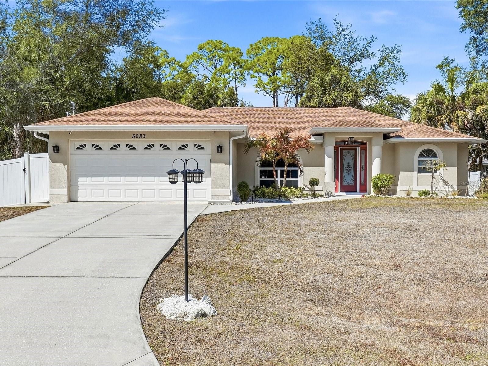 Welcome to this TURNKEY, MOVE-IN READY Florida retreat perfectly positioned on a SOUTH-FACING 80x125 lot in the growing city of North Port. Offering 3 bedrooms, 2 bathrooms, and 1,519 sq ft of thoughtfully designed living space, this beautifully maintained 2006 residence delivers comfort, quality finishes, and true Southwest Florida lifestyle appeal — all in Flood Zone X (NO flood insurance required).
Step inside to a bright, open floorplan featuring porcelain tile throughout (no carpet!), a split-bedroom layout for privacy, and abundant natural light. The spacious living and dining areas flow seamlessly into the kitchen, where you’ll find:
• Solid wood cabinetry
• Granite & stone countertops
• Tall breakfast bar seating
• Stainless appliances
• Eating space/dinette area
• Water filtration system, water softener & whole-house R.O.
The primary suite offers a peaceful retreat with a walk-in closet and an en-suite bath featuring dual sinks, granite counters, and linen storage. Two additional guest bedrooms provide flexibility for family, home office, or seasonal visitors.
Enjoy Florida evenings on the epoxy-finished lanai with ceiling fan, overlooking your vinyl-fenced backyard with room to add a pool. The home is situated on a paved street with no HOA fees and no CDD — giving you freedom and flexibility.
Additional Highlights:
* 2-Car Attached Garage with opener
* Central Air & Electric Heat
* Well Water & Septic (no city water bills)
* BB/HS Internet & Cable Available
* Turnkey Furnishings Included
* Zoned RSF2
Located near shopping, dining, medical facilities, golf courses, and just a short drive to Gulf Coast beaches, making it ideal for full-time residents, snowbirds, or investors seeking strong Florida resale appeal.
Whether you're searching for a North Port single family home, Florida retirement property, winter retreat, or income opportunity, this impeccably kept residence checks all the boxes.
Schedule your private showing today — Florida living starts here.