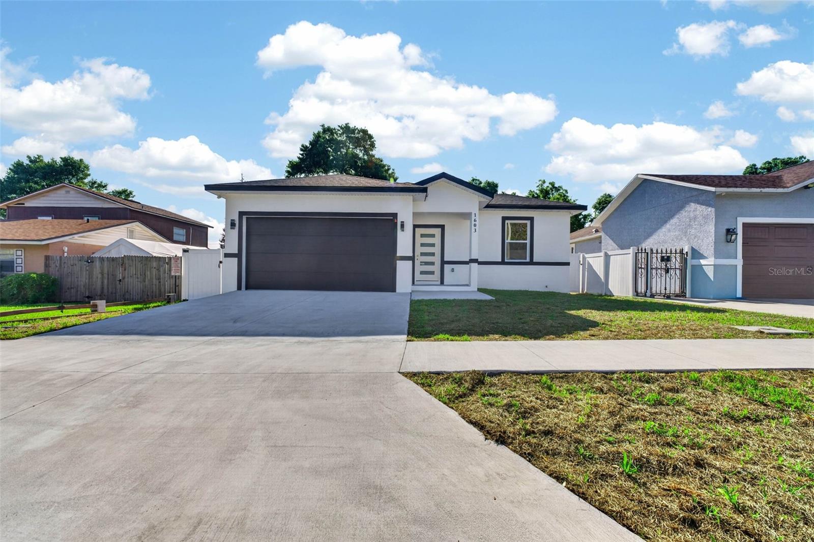 This gorgeous new construction home offers 4 spacious bedrooms, 3 full bathrooms, and an attached 2-car garage, blending modern elegance with exceptional craftsmanship. A standout feature is the private second primary suite, complete with its own separate entrance, making it ideal as an in-law suite, guest quarters, or private living space for extended family.
The gourmet kitchen is beautifully appointed with brand-new stainless-steel appliances, including a refrigerator, dishwasher, cooktop, microwave, and combination wall oven. It also features 42-inch real wood cabinetry with crown molding, a full tile backsplash, soft-close doors and drawers, and luxurious granite countertops, creating the perfect space for everyday living and entertaining.
Designed for both comfort and style, this home includes impact-resistant windows, a vinyl privacy fence, elegant sliding glass doors with built-in blinds for easy maintenance, ceiling fans in every room, and durable tile flooring throughout.
The spacious primary suite features a walk-in closet and a luxurious en-suite bathroom with dual vanities and a large, beautifully tiled walk-in shower.
Additional highlights include a convenient interior laundry room, premium finishes throughout, and quality craftsmanship that make this exceptional home truly move-in ready.