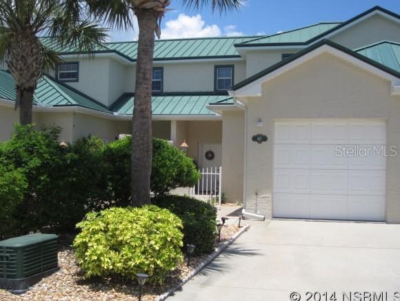 Spacious 3 bedroom/3 bath with Garage located in Bouchelle Island. Beautiful Courtyard Garden Entry. Two Master Suites one ground floor & one second floor plus a Third bedroom with private bath.  2 screened Terraces over looking tropical setting.Bouchelle Island is a Riverfront Community with many Amenities to include 2 Pools, Clubhouse, Tennis, Exercise facility,Boat slips, Boat dry storage,Boat ramp into River/ICW. Close to the Beach, Shopping & Restaurants. ;LocationDescription: Condo ;Water: City
