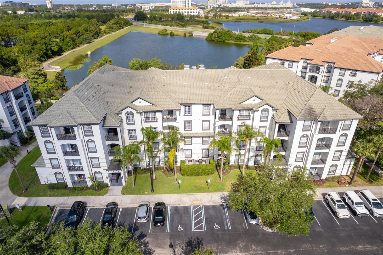 Rarely available and barely lived in — this immaculate condo was used exclusively as the owner's second home and shows true pride of ownership throughout. Move-in ready with a brand-new AC system already in place, this unit offers a turnkey opportunity in one of Orlando's most sought-after resort communities. Located in Vista Cay Resort, you'll enjoy an unbeatable, ultra-central location just 4 minutes from the brand-new Epic Universe and 3 minutes to International Drive, putting world-class theme parks, dining, shopping, and entertainment at your fingertips. Vista Cay offers resort-style amenities including sparkling pools, hot tubs, a kids' splash pad and Aqua Park, fitness center, sports courts, and a children's play area — all set against stunning views of Orlando's skyline and Lake Cay. Whether you're seeking a personal retreat, an investment property, or a high-performing short-term rental, this pristine, low-usage condo checks every box. Don't miss this rare opportunity in a prime location near Orlando's top attractions.