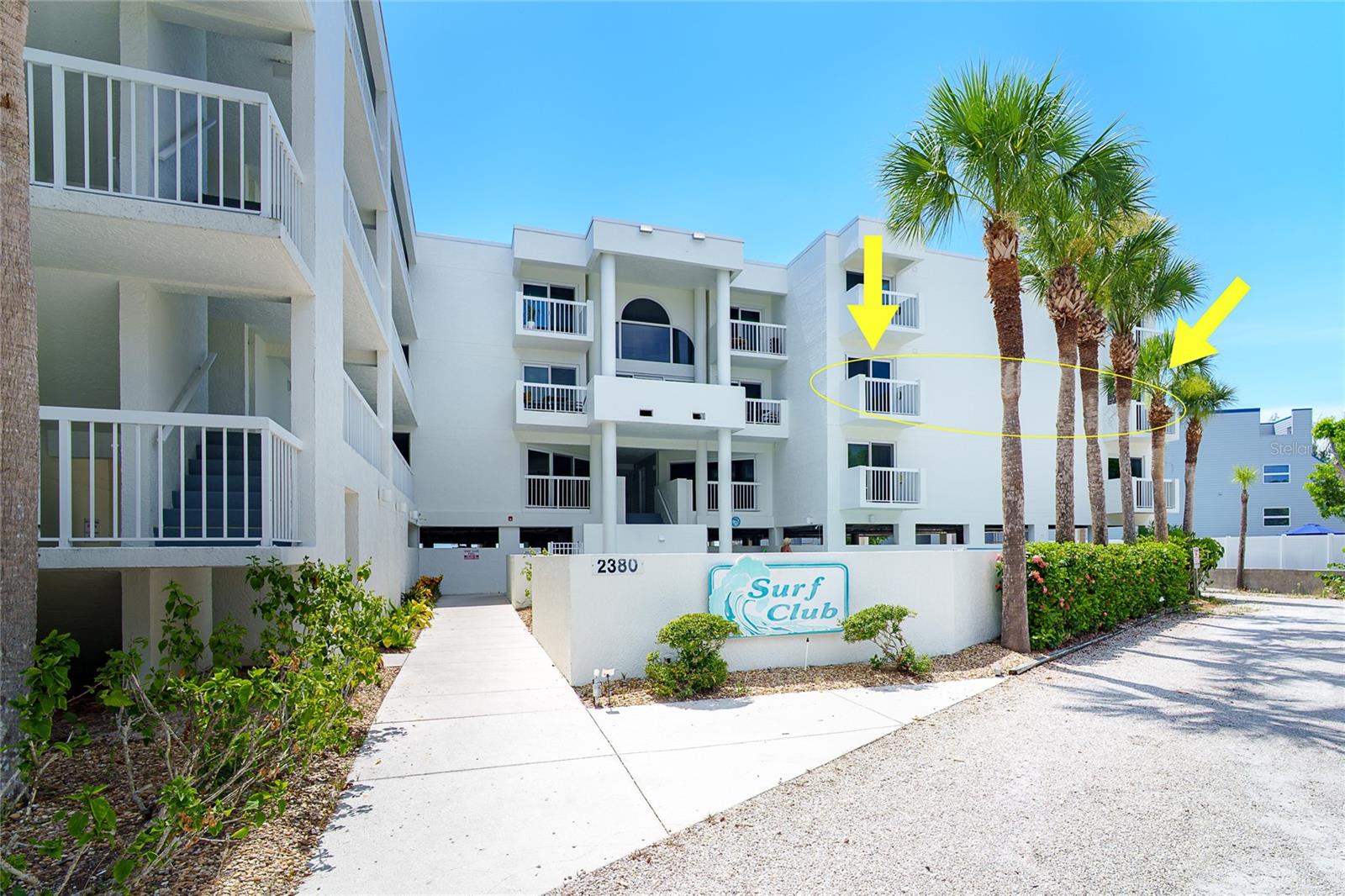 Experience the ultimate in coastal living at SURF CLUB, Manasota Key's premier beachfront condominium community. This light-filled, TURN-KEY FURNISHED two-bedroom, two-bath residence offers the perfect blend of comfort, style, and resort-inspired living. Ideally situated near the elevator, this RARELY AVAILABLE, beautifully maintained END-UNIT provides effortless access to two assigned parking spaces (one covered and one open) and the private boardwalk leading through the dunes to the pristine Gulf beach. Residents also enjoy exceptional amenities, including a heated pool, fitness center, and beautifully maintained tropical grounds. Inside, the thoughtfully designed split-bedroom floor plan offers both privacy and functionality for owners and guests alike. TASTEFULLY DECORATED in a relaxed coastal style, the residence features THREE COVERED BALCONIES allowing you to enjoy the outdoors from multiple vantage points. Both bedrooms overlook Surf Club's sparkling pool, while the spacious main lanai offers a charming peek-a-boo view of the turquoise waters of the Gulf of Mexico. The primary suite is a true retreat, featuring direct access to both the main lanai and a second private balcony, a generous walk-in closet, and an ensuite bath complete with dual vanities, a walk-in shower, a separate soaking tub, and a large linen closet. The guest bedroom also enjoys its own private balcony with peaceful pool views, creating a welcoming space for family and friends. Designed with comfort and efficiency in mind, the lanai sliding doors feature DOUBLE PANE LOW E (low emissivity) GLASS, helping improve energy efficiency while reducing UV exposure and protecting interior furnishings. Additional updates include a NEWER HVAC AND HOT WATER HEATER for enhanced peace of mind. A FULL-SIZE STACKED WASHER & DRYER are conveniently located within the unit. When hosting overnight guests, you'll appreciate the attractive MURPHY BED CABINET with a comfortable tri-fold foam mattress, providing additional sleeping accommodations without sacrificing living space. Close to all the best that Manasota Key offers, is casual and upscale dining, and daytime and evening nightlife. In town and so close, are world class fishing, golf, and quaint shops on Historic Downtown Dearborn Ave. Whether you're searching for a full-time residence, seasonal retreat, or investment opportunity, this exceptional beachfront condominium offers everything needed to embrace the relaxed island lifestyle. Don't miss this rare opportunity to own your piece of paradise on MANASOTA KEY where breathtaking sunsets, gentle Gulf breezes, and every day feels like a vacation! Call today for your private tour!