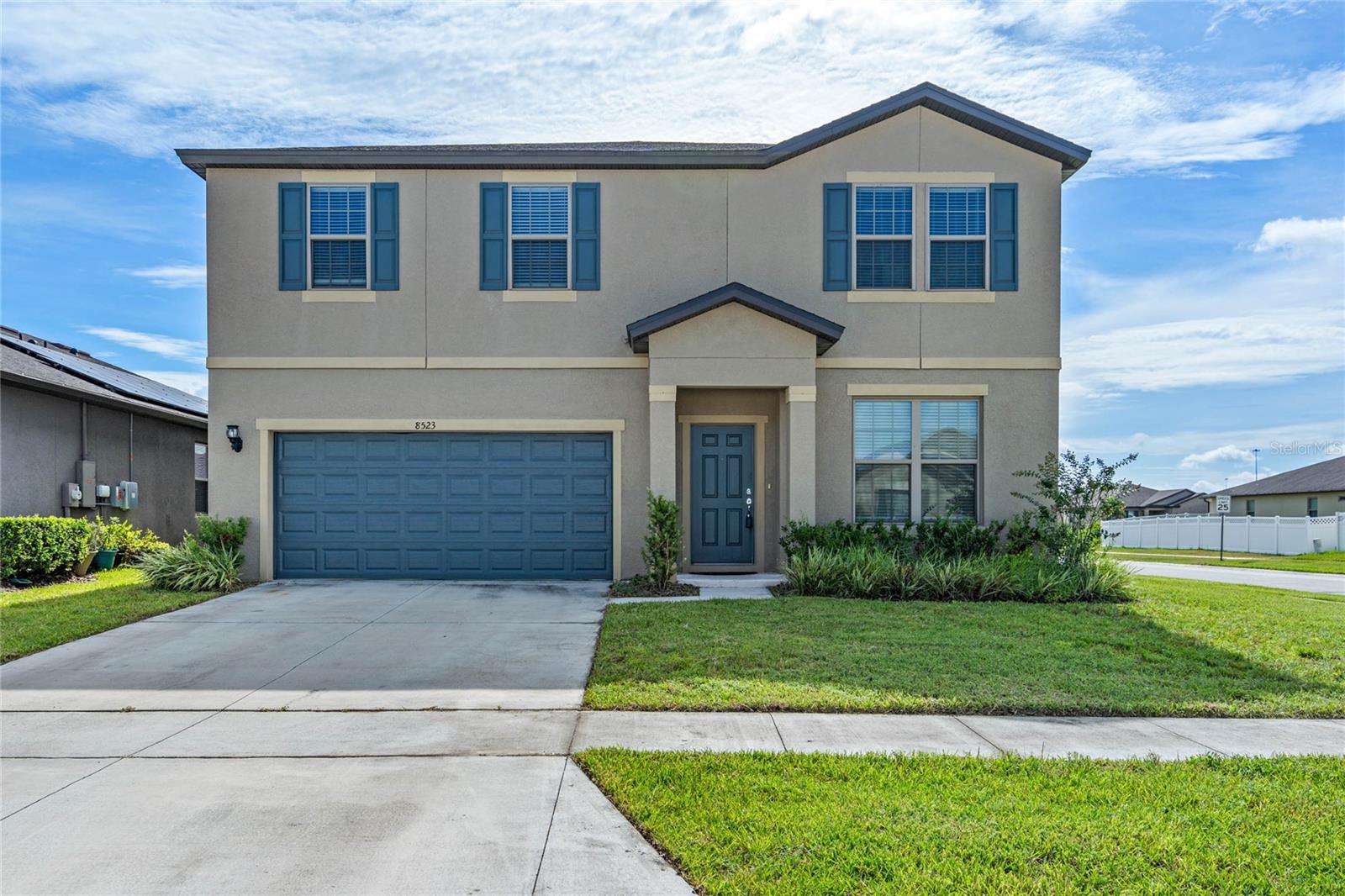 Great Opportunity Awaits on this 2021 built 5 bedroom and 3 full bath home. Why worry about insurance on an older home when you can have a 2 year old roof, HVAC and everything else! Open floor plan with huge solid surface center island counter, solid wood cabinets with crown molding all complimented with a stainless steel appliance package. Spacious family room plus 1 full bed and bath downstairs. Upstairs you will find the master suite with a double sink vanity, shower and walk in closet. 3 additional secondary bedrooms plus a loft/bonus/game room. All situated on a beautiful corner homesite with a partial water view. Location benefits include easy access to I4 to Orlando, Lakeland & Tampa, Disney and much more! 5 minutes from both Amazon and Best Buy's distribution centers