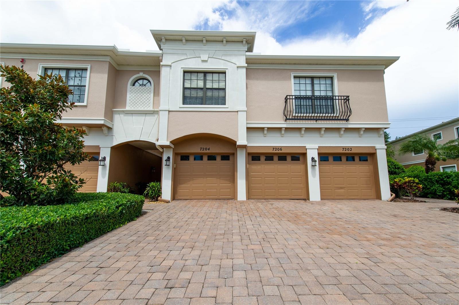 Experience maintenance -free living at its best. This beautiful Drake model has three bedrooms, and 2 baths on the ground floor. Complete with a one car garage and inside laundry. Kitchen has stainless steel appliances and tile flooring, and the rest of the condo has luxury vinyl planking.
Relax on the back lanai with a peaceful green space with no buildings behind you. This complex is approximately 5 miles from the beach, and walking distance to shopping and restaurants. 
This community has sidewalks throughout, dog friendly, beautiful community pool, and recreational facilities.