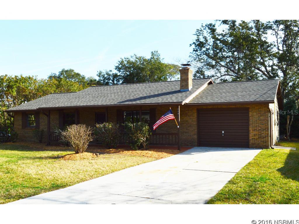 Nicely renovated home with NEW roof, beautiful NEW Kitchen w/ eat-in dining area, NEW stainless appliances, NEW granite countertops, NEW flooring, and NEW paint. This 1400 +/- sq ft home has been updated for a higher standard of living all around. The bathrooms are upgraded but with the use of art deco color tiles in the showers and bath areas. One has a step in shower, the other a bathing tub. The perfect mix of old and new brings this home to life. There is a large rear screened patio area to enjoy the morning sun overlooking a very private backyard. This lot is 126 feet deep on record but in fact is deeper and goes down to a tidal basin area where one can explore and fish. There is an older greenhouse structure on the property that could be brought back up to speed with a little TLC. This property has a wide 1 car garage and large separate laundry storage area. Centrally located, it's an easy quick drive to the heart of New Smyrna Beach or Port Orange. Close to public boat ramp, restaurants, sports complex, etc. Move in ready now! ;Water: City