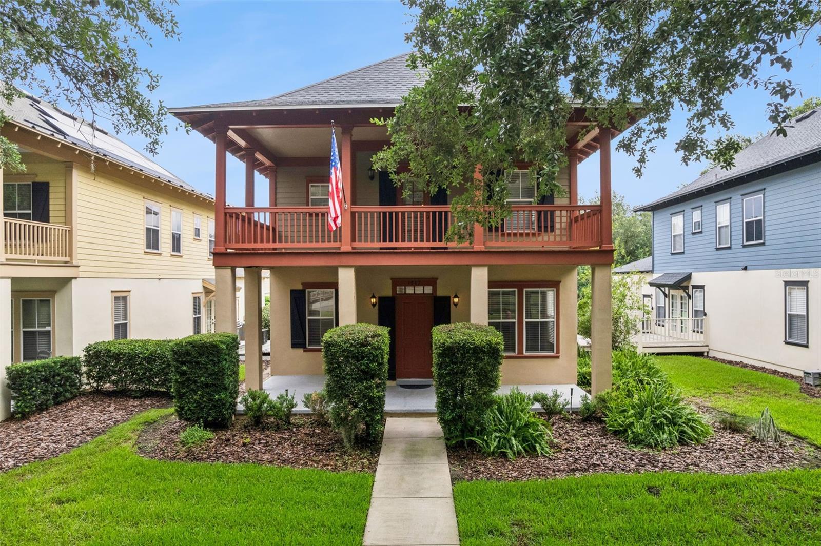 Virtually Staged. Step into a lifestyle where timeless charm meets modern comfort at 1017 Old Blush Road. Nestled within the iconic community of Celebration, this Cambridge-built St. Augustine bungalow showcases the highly sought-after Peachtree floorplan, offering exceptional curb appeal with classic architecture and a stunning double front porch that welcomes you home.
One of the home's most captivating features is its exceptional outdoor living space. Relax on the expansive front porch or retreat to the covered second-story balcony, both overlooking a tranquil pond and protected conservation area. Whether you're enjoying your morning coffee, watching the sunset, or simply taking in the sights and sounds of nature, these inviting spaces provide the perfect backdrop for everyday living.
Inside, the freshly painted interior creates a bright, inviting atmosphere, while large windows fill the home with natural light. The open-concept design effortlessly connects the spacious living, dining, and kitchen areas, creating an ideal setting for both entertaining and everyday life. The well-appointed kitchen offers abundant cabinetry, generous workspace, and a seamless flow into the main living areas, making it the true heart of the home. Recent major improvements, including a new roof (2020) and new HVAC system (2023), provide added value and peace of mind.
A versatile downstairs study or hobby room adds incredible flexibility to the floorplan. Whether you need a private home office, craft room, library, fitness space, playroom, or potential fourth bedroom, this adaptable space easily accommodates your lifestyle.
Upstairs, the spacious primary suite serves as a private retreat, complete with a generously sized bedroom and a spa-inspired ensuite bath designed for relaxation. Two additional bedrooms provide comfortable accommodations for family and guests while offering flexibility for a secondary office or creative space.
Step outside to the private side courtyard, an intimate outdoor oasis perfect for al fresco dining, grilling with friends, or simply enjoying Florida's year-round sunshine in a peaceful setting.
Living in Celebration means embracing one of Central Florida's most desirable communities. Just a short bike ride from the vibrant downtown district, you'll enjoy charming boutiques, lakeside restaurants, community events, farmers markets, and miles of scenic walking and biking trails. Combining classic architecture, thoughtful updates, versatile living spaces, and an unbeatable location, 1017 Old Blush Road offers an exceptional opportunity to experience the Celebration lifestyle at its finest.