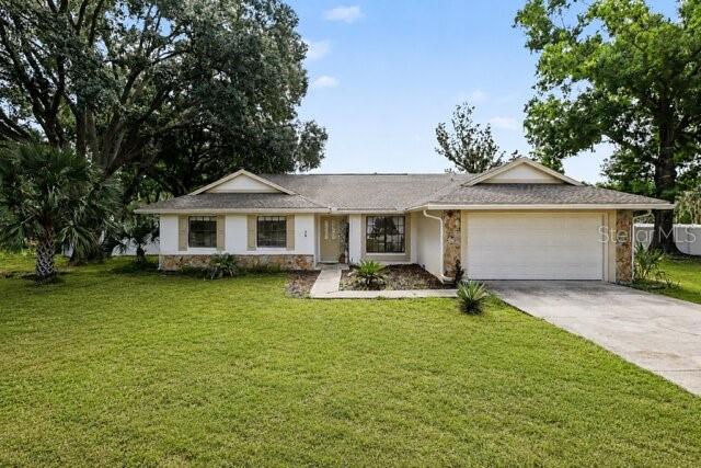 Virtually Staged. Welcome to your private Florida retreat! Nestled on a rare 1.18-acre homesite in the heart of Brandon, this beautifully maintained 4-bedroom, 3-bath pool home offers the perfect combination of space, privacy, and endless possibilities. Opportunities like this are few and far between—especially in such a convenient location.

From the moment you arrive, you'll appreciate the peaceful setting surrounded by mature trees and lush landscaping. Inside, natural light pours through oversized windows, creating a warm and inviting atmosphere. With over 2,400 square feet of living space, this home offers multiple living and entertaining areas, making it ideal for growing families, multi-generational living, or anyone who loves to host. For added peace of mind, the roof is only six years old, offering years of life ahead.

Step outside into your own private backyard oasis featuring a sparkling swimming pool with an attached spa, perfect for relaxing after a long day or entertaining family and friends year-round. The expansive 1.18-acre lot provides endless possibilities for outdoor living, whether you envision lush gardens, a play area, space for pets to roam, or simply enjoying the privacy and tranquility that is increasingly hard to find. Unlike today's new construction communities with limited yard space, this property gives you the freedom to spread out and truly enjoy the Florida lifestyle.

Conveniently located just minutes from shopping, dining, medical facilities, highly rated schools, and major commuter routes including I-75 and the Selmon Expressway, you'll enjoy easy access to downtown Tampa, MacDill Air Force Base, Tampa International Airport, and Florida's award-winning Gulf Coast beaches.

Enjoy some of Brandon's favorite attractions nearby:

Spend the day kayaking, swimming, or picnicking at Lithia Springs Park.
Explore miles of hiking, biking, and horseback riding trails at Alafia River State Park.
Enjoy an evening along Tampa's Riverwalk, just a short drive away.
Local Favorites:

Breakfast: Himes Breakfast House
Lunch: The Stein & Vine
Dinner: Allegria Italiana
If you've been searching for a home that offers acreage, privacy, a pool and spa, and room to create the lifestyle you've always wanted—without sacrificing convenience—4504 Deer Park Place is the one you've been waiting for. Schedule your private showing today!