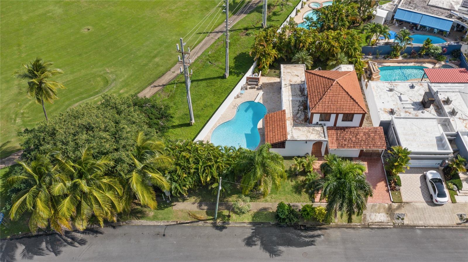 Located in the sought-after Dorado del Mar community, this spacious two-story residence sits on a large corner lot directly across from the golf course, offering open views and a serene setting. With over 2,000 sq. ft. of living space, the home features a functional layout, including two bedrooms and two full bathrooms on the first floor, ideal for convenience and flexibility.

Designed for both relaxation and entertaining, the property includes a private pool and outdoor terrace, perfect for enjoying Dorado’s year-round tropical lifestyle. The remaining bedrooms are located upstairs, providing separation and privacy for family or guests.

This home is also Airbnb and short-term rental friendly, making it an excellent opportunity for both personal use and investment. Dorado del Mar continues to grow in appeal, with the golf course recently upgraded, new hospitality developments like the upcoming Hilton Garden Inn, and ongoing improvements throughout the community. A rare opportunity to own in one of Dorado’s most established and evolving neighborhoods.