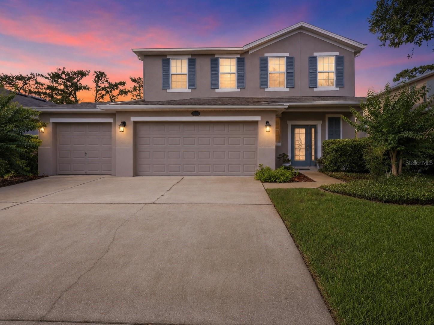 Original owner home with a 3-car garage, private fenced-in backyard, and move-in-ready condition! Located in Victoria Trails, this 4 bedroom, 2.5 bathroom home offers over 2,200 square feet of living space in a convenient DeLand location close to groceries, shopping, Downtown DeLand, and easy highway access—about 35 minutes to New Smyrna Beach and 40 minutes to Downtown Orlando. From the moment you arrive, the wide 3-car driveway and 3-car garage stand out, offering plenty of parking and storage. Inside, the vaulted foyer creates a grand entrance, while the downstairs layout provides the best of both worlds with open-concept living, a dedicated formal dining room, and an eat-in kitchen space. The kitchen features 42 inch upper cabinets and granite counter with a convenient island for more counter and storage space! The screened lanai overlooks the beautifully landscaped, fenced-in backyard, giving you a level of privacy that can be hard to find in a newer home. Upstairs, you’ll find four generously sized bedrooms, including a spacious primary suite with an en-suite bathroom featuring dual vanities, a soaking tub, and separate shower. The laundry closet is also conveniently located upstairs near all of the bedrooms, making everyday living that much easier. The HOA fee includes streaming tv, fiber internet, multiple community pools, irrigation supply water and more!