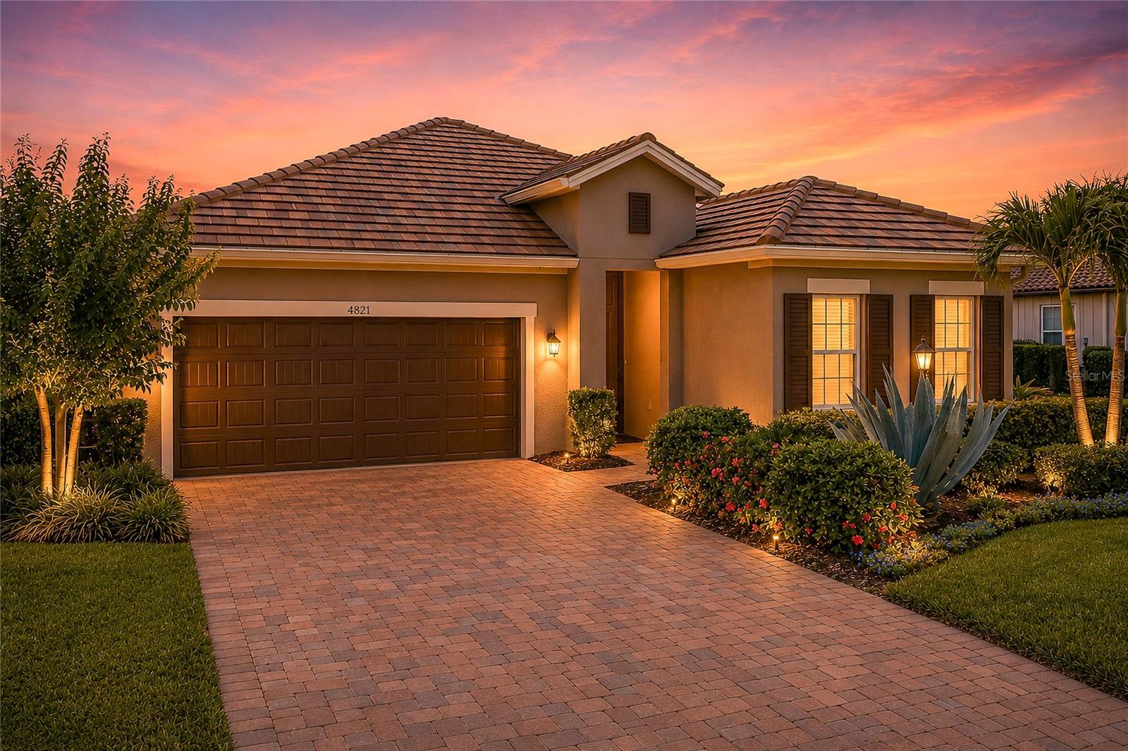MOVE-IN READY WATERFRONT HOME in the highly sought-after gated community of Rosedale Golf & Tennis Country Club located in the Bradenton/Lakewood Ranch area! This popular Ashton Woods Lazio floor plan offers 3 bedrooms, 2 baths, and an open-concept design perfectly suited for today's lifestyle. Built for both comfort and entertaining, the bright and airy kitchen showcases 42" light Wellborn cabinetry with crown molding, quartz countertops, an oversized center island, white tile backsplash, stainless steel Whirlpool appliances, and a gas range. The spacious great room seamlessly flows to the outdoor living area, creating the ideal indoor-outdoor Florida lifestyle.

Designer features include wood-look ceramic tile flooring throughout the main living areas and bedrooms, tray ceilings, 8-foot interior doors, abundant natural light, a Mediterranean-style tile roof, paver driveway, 2-car garage, and in-wall pest control system. The private owner's suite offers a relaxing retreat with tranquil water views and a well-appointed ensuite bath.

Step outside to the extended covered lanai and enjoy breathtaking sunset and water views while sipping your morning coffee or entertaining guests. This low-maintenance home is perfectly positioned to take advantage of Florida's year-round outdoor living.

Located within the premier gated community of Rosedale Golf & Tennis Country Club, residents enjoy optional golf memberships and access to exceptional amenities including Har-Tru tennis courts, pickleball, bocce ball, a junior Olympic swimming pool, state-of-the-art fitness center with classes, and a 22,000-square-foot clubhouse featuring dining, social events, and an active lifestyle calendar. HOA fees include lawn maintenance, cable TV, high-speed internet, two 24-hour manned gates, and dog parks. NO CDD FEES.

Ideally situated just minutes from Lakewood Ranch, UTC Mall, premier shopping, dining, Sarasota-Bradenton International Airport, top-rated healthcare facilities, and the world-renowned Gulf Coast beaches. Why wait to build when you can enjoy this like-new home today? Schedule your private showing and discover why Rosedale remains one of the area's most desirable golf and tennis communities.