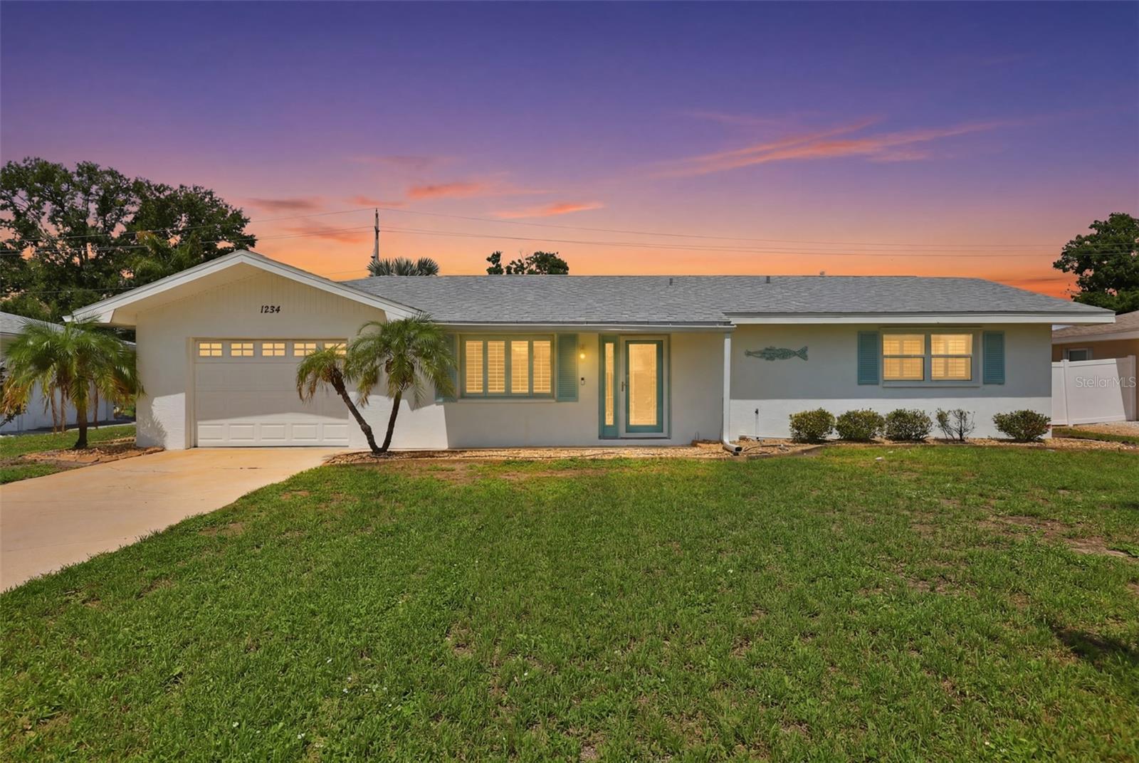 Welcome to your POOL HOME in beautiful Sun City Center! No CDD and LOW HOA. This 2 bedroom / 2 Bath /1.5  car garage home has a peaceful pond and golf course view, no backyard neighbors.  Beautifully updated kitchen with an induction range, convection oven and new refrigerator, wood-look tile floors and updated bathrooms are just a few reasons you will want to make this your home. Beautiful plantation shutters on all the windows give this home a tropical feeling. Enjoy your very own outside oasis with a screened-in, heated pool with a waterfall and lanai area, large enough to host big gatherings and enjoy the Florida lifestyle plus a fully fenced back yard. The garage is large enough for a car and a golf cart.  Multiple upgrades include newer hurricane windows ( except for the front window)  Roof 2023, New Washer and Dryer 2025, new water heater and electric panel with whole house surge protector 2026, new chlorine generator for the pool 2025, new guest bathroom vanity 2026, new AC wall unit in the Florida room 2025, water softener, and irrigation system. This home is fully furnished ( except for the TV's and some wall hangings, dishes and linens).  The patio furniture is included too. A battery powered lawn mower, weed eater, blower, and pole saw stay with the home. Life in Sun City Center is all about enjoying yourself with over 200 clubs and activities from fitness classes and pickleball to arts, crafts, travel groups, and many volunteer opportunities. You can stay as active (or relaxed) as you like. The indoor and outdoor pools, a fitness center, dance and yoga classes are just a few ways to meet new friends. You can hop in your golf cart and cruise to nearby shops, restaurants, grocery stores, and doctor's offices. Plus, you're just a short drive from Florida's beautiful beaches, two major airports, sporting events, and major attractions. If you've been looking for a comfortable home with a beautiful view and a community that truly feels like home, this is the perfect fit. Come enjoy the lifestyle you've earned in this welcoming active adult community!