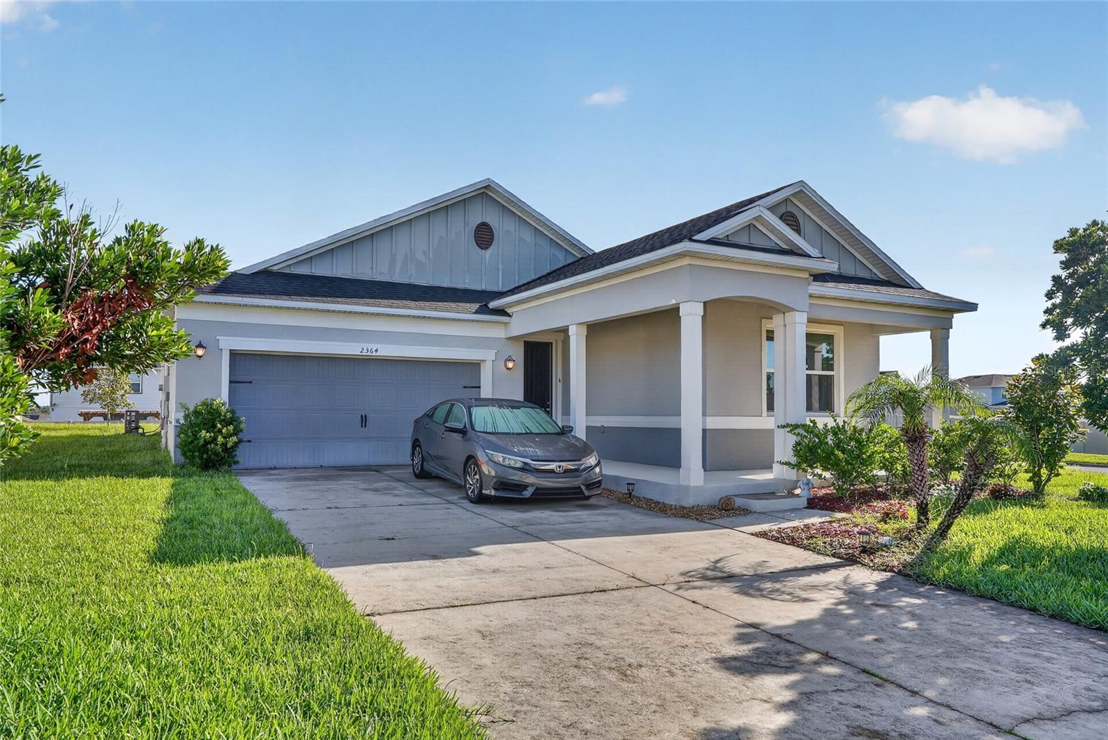STOP! You will not see a need to look any further! 
Welcome home to this beautifully maintained 4-bedroom, 2-bath, 2-car garage home in the desirable Carriage Hill community of Apopka! Situated on a desirable corner lot, this 2020-built home offers the perfect blend of modern style and everyday comfort. Step inside to find durable LVP flooring in the dining and living room areas, complemented by ceramic tile in the kitchen, laundry room, and bathrooms.The primary suite features a stunning updated bathroom. Enjoy Florida living year-round in the screened-in patio, ideal for morning coffee or evening relaxation. With its prime corner lot position, thoughtful updates, and sought-after community location, this home is ready to welcome its next owners. Schedule your showing today!