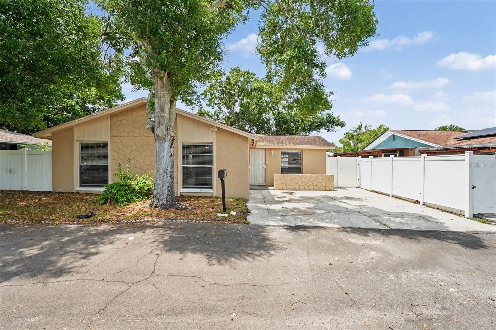 Welcome to this 3-bedroom, 2-bathroom home in the desirable Cameo Villas Unit 1 neighborhood. This residence features a welcoming open floor plan that provides a seamless and airy flow throughout the main living areas. The kitchen is nicely appointed with beautiful granite countertops and crisp white appliances, creating a highly functional space for daily living and cooking. Step outside to enjoy the privacy of a fully fenced-in backyard, offering a secure and open space for outdoor relaxation or entertaining. Ideally situated near Tampa International Airport, shopping, dining, and entertainment, this home also offers easy access to the Suncoast Parkway for a quick and convenient commute to Downtown Tampa. Schedule your private showing today!