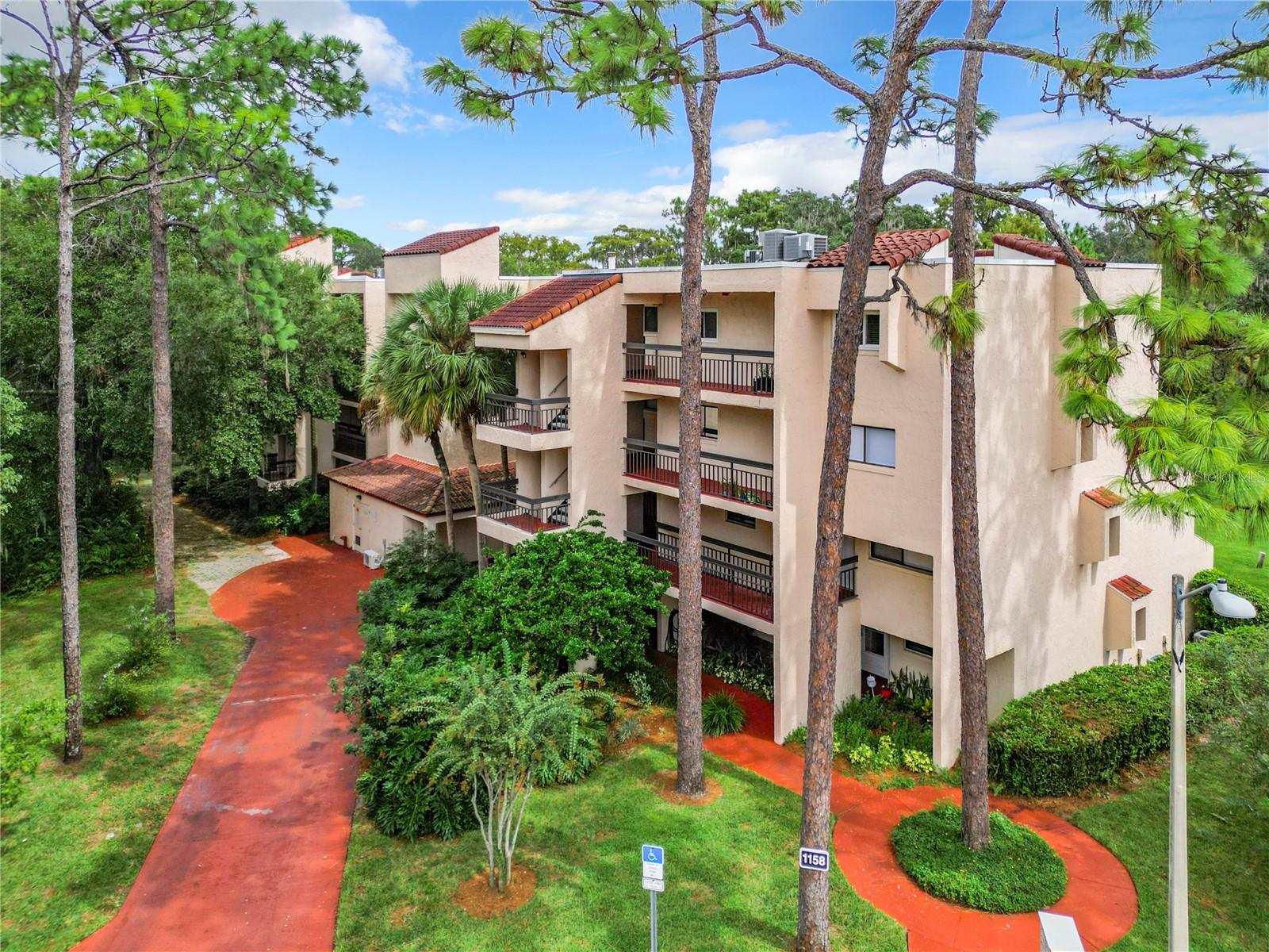 Experience elevated lakefront living in the gated Carmel by the Lake community on beautiful Lake Howell in Seminole County. This spacious fourth-floor residence, conveniently accessed by elevator, offers 1,876 square feet of thoughtfully designed living space with 3 bedrooms, 2 bathrooms, and an open-concept layout that showcases breathtaking views of the lake and beautifully landscaped grounds from your private balcony. Wake up each morning to breadth taking peaceful scenery and enjoy a true resort-style lifestyle with exclusive private access to Lake Howell for boating, fishing, kayaking, and paddle boarding. Community amenities include a sparkling swimming pool, tennis courts, clubhouse, and meticulously maintained grounds, all within the security of a gated community. The HOA provides exceptional value by covering water, sewer, cable TV, high-speed internet, exterior maintenance, roof maintenance, and grounds care, allowing you to enjoy a carefree, lock-and-leave lifestyle. Perfectly located just minutes from Winter Park, Maitland, Lake Mary, Altamonte Springs, and Downtown Orlando, this home offers convenient access to major highways, premier shopping, dining, entertainment, top-rated medical facilities, and Orlando's world-renowned attractions. Whether you're searching for a primary residence, seasonal getaway, or low-maintenance luxury retreat, this exceptional waterfront condo offers the perfect blend of comfort, convenience, and Florida living. Schedule your private showing today and discover why Carmel by the Lake is one of Central Florida's most desirable lakefront communities to call home.