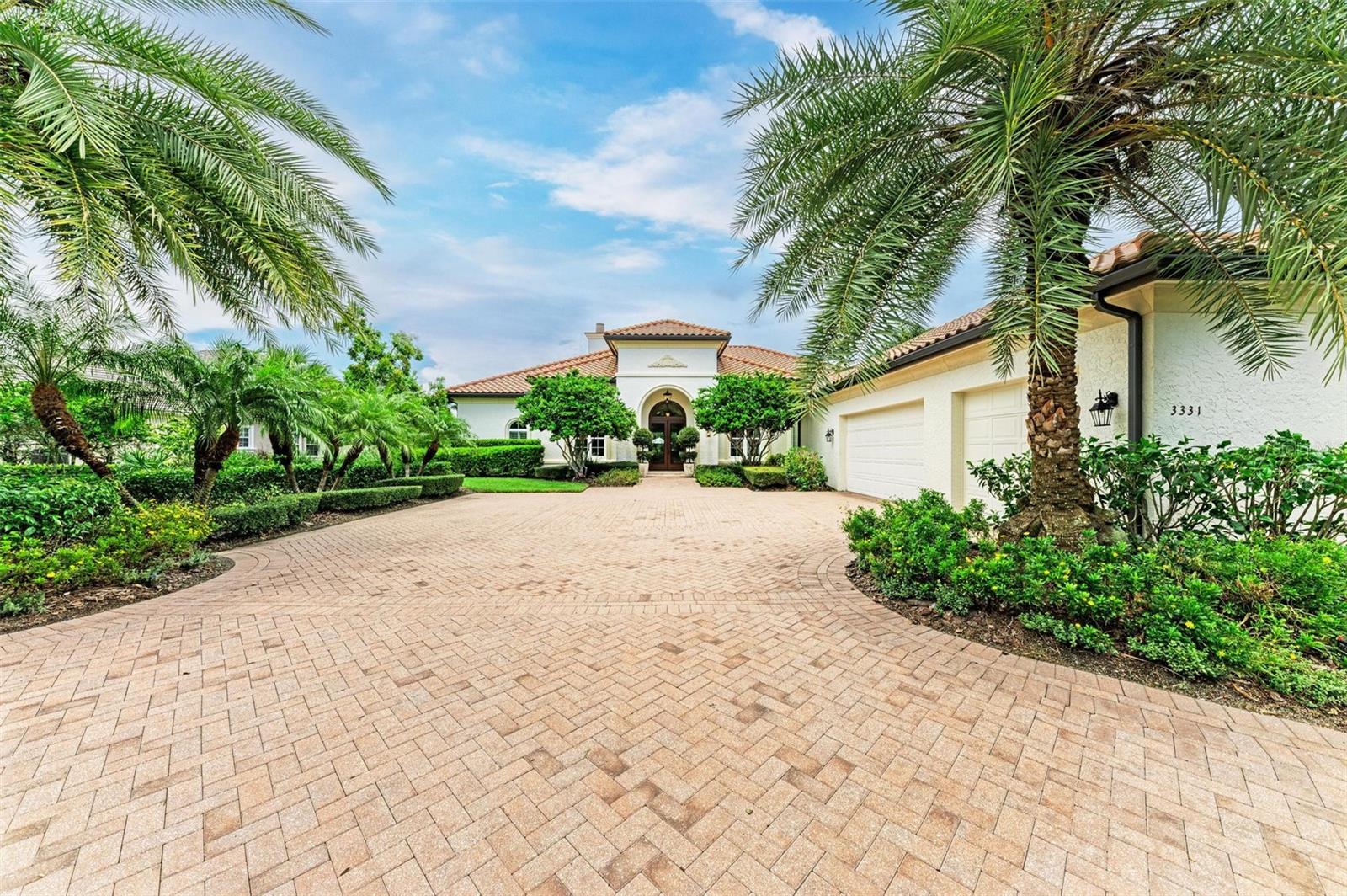 Magnificent custom London Bay home with sweeping views, elegant architectural details, and gorgeous design features. Simply a must-see for those seeking the Founders Club lifestyle. Come home to a private sanctuary and incredible sunsets each evening set against the backdrop of the 16th fairway. 

Situated on a prime homesite with over 1/2 an acre of land with stunning golf, preserve, and lake views. The exterior of this home is timeless and enhanced with mature landscaping and a semi-circle driveway. The handsome double door entry leads to a sunlit foyer and living room with soaring ceilings. The lovely single-story layout is open and offers connected main living spaces for gathering with seamless indoor and outdoor living. The well-appointed primary suite shares a wing with a private study. On the other side of the home, the spacious guest suites offer privacy and separate bathrooms. A showcase gourmet kitchen with solid wood cabinetry, double oven gas range with decorative hood, and ‘Taj ‘Mahal’ natural quartzite stone is perfect for a home chef and entertaining. A butler’s pantry offers additional storage with a sink and prep area.  Superb construction quality including impact glass, solid core doors, genuine satin travertine flooring, exposed wood beams and much more. The outdoor living is spectacular with a luxurious colonnade screen enclosure, a deep covered lanai, beautiful pool and spa, and an extended sun deck off the guest suite. This home is priced far below reproduction cost and must be seen to be fully appreciated. The Founders Club is in non-flood zone X, minutes to Lakewood Ranch and downtown Sarasota, with easy access to farmers markets, shopping, fine dining, theater, and world class beaches. The prized Robert Trent Jones Jr. course is the only walkable course in the region, and members enjoy easy tee-times. Social and golf memberships optional. The community offers Har-Tru tennis courts and a clubhouse with fitness center and restaurant with veranda. Come tour this home and discover an exceptional residence and lifestyle.