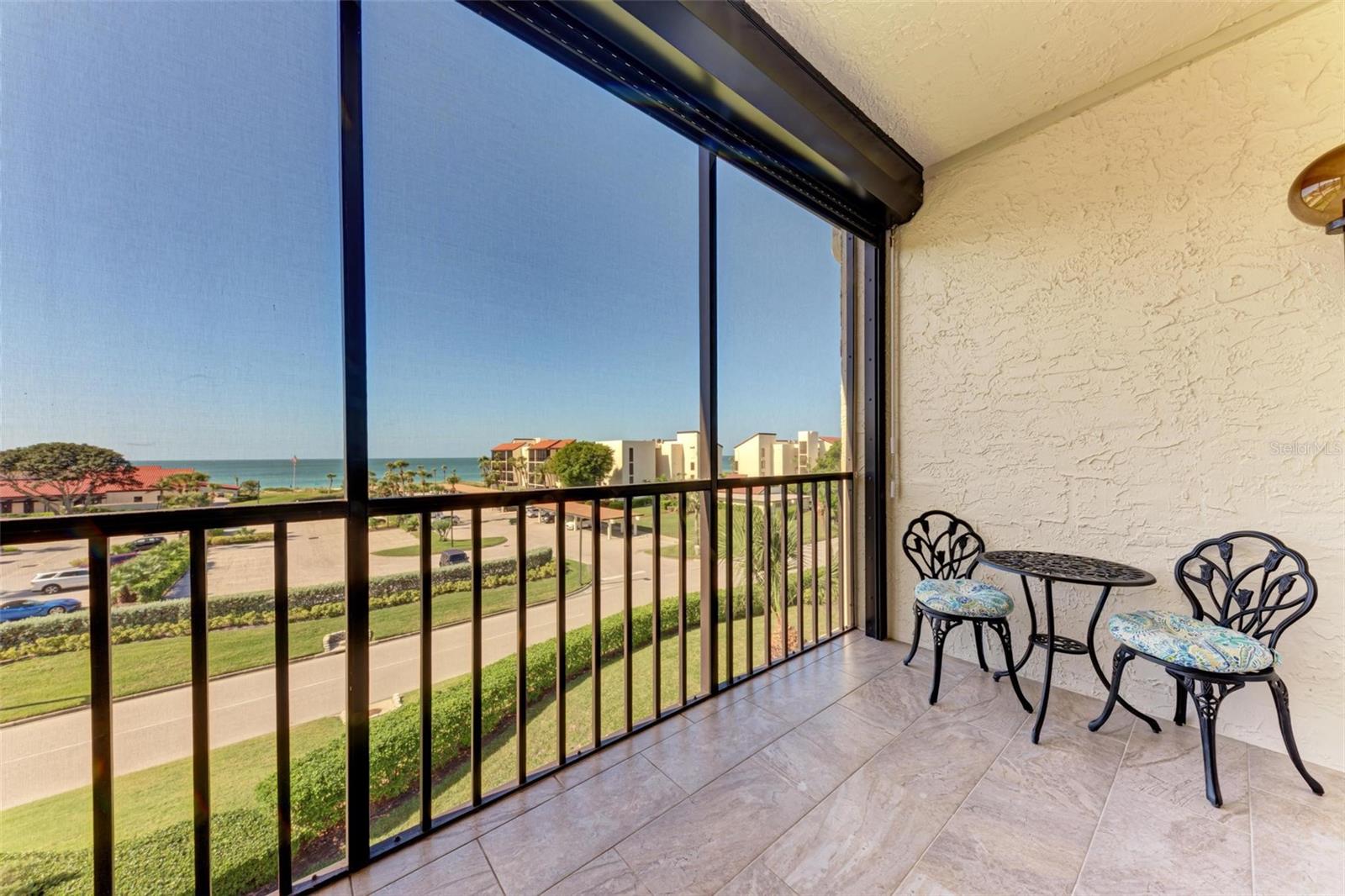 Beautifully decorated and renovated, furnished 2 bed 2 bath condo with direct Full Gulf of Mexico views. Breathtaking views from the doorway throughout the kitchen, dining and bedroom. The well-appointed kitchen has an open view of the azure blue waters, a breakfast bar, private washer and dryer. Bright clean white cabinetry with soft close drawers, quartz counter tops and the hot water heater was replaced in 2021. At Seaplace, you can leave the maintenance up to the on-site management and staff that care for the incredibly manicured and maintained property year-around. The social committee puts on golf outings, sunset meet -ups, and tons of events that your welcomed by the owners to attend. This building in Seaplace has 4 floors, 409 is the top floor “Penthouse” with 9 foot ceilings and no neighbors above it. The building is equipped with an elevator, hotel bell dolly, grocery carts and an extra storage unit. They put a new roof on just this year (2023). If your load is light, you can enjoy the weather and take the open air stairs. Being located on the south Sarasota county side of Longboat Key gives quick access to Saint Armands circle and Downtown Sarasota's restaurants, festivals, events, galas and shops. Enjoy long beach walk and trails throughout the acres of property that the condo association spans. Tennis courts, 2 heated swimming pools “the Fun Pool” one is called, hot tub, kiddie pool, newly updated clubhouse with outdoor bbq grills, playground, 24 hour guard gate, direct beach access and a stones throw from the Longboat Key Club where golf and beach meet. Call for private or virtual tour.