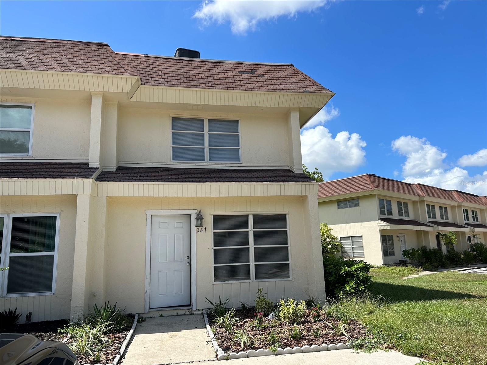 Looking for a 2-bedroom, 1.5-bathroom condo just 3 miles or a 10-minute drive from Downtown Sarasota
                  Welcome to your new home in the charming Fairway Oaks community in Sarasota!!!!
This beautiful townhouse style condo is move-in-ready. Nicely updated END-UNIT open floor plan and lots of natural light! Upgrades include new floors, paint, lights and more. this home is sure to impress. As you step through the front door, you're welcomed into a well-lit, and inviting living room, perfect for get-togethers with friends and family. On the right-hand side, you'll find a sizable closet and staircase leading upstairs to the bedrooms and full bath. Continuing through the living room downstairs, you'll pass by the half bath and interior laundry to the dining area and upgraded kitchen, complete with stainless steel appliances, granite countertops and solid cabinetry. The kitchen/dining area feature glass sliding doors leading out to a screened-in back porch with a private, extended patio, providing the perfect space for entertaining or relaxing while taking in the picturesque views of the Circus Trail Park oak trees. Both stylish and functional, this home includes 2 designated parking spots, and is updated with tasteful fixtures and finishes. Additionally, the END UNIT feature ensures added privacy, making it an ideal oasis for your family. Located in a highly convenient area, you'll find a gas station, grocery stores, restaurants, post office, shopping centers, and more, all within a half-mile radius. This rare opportunity is not to be missed!