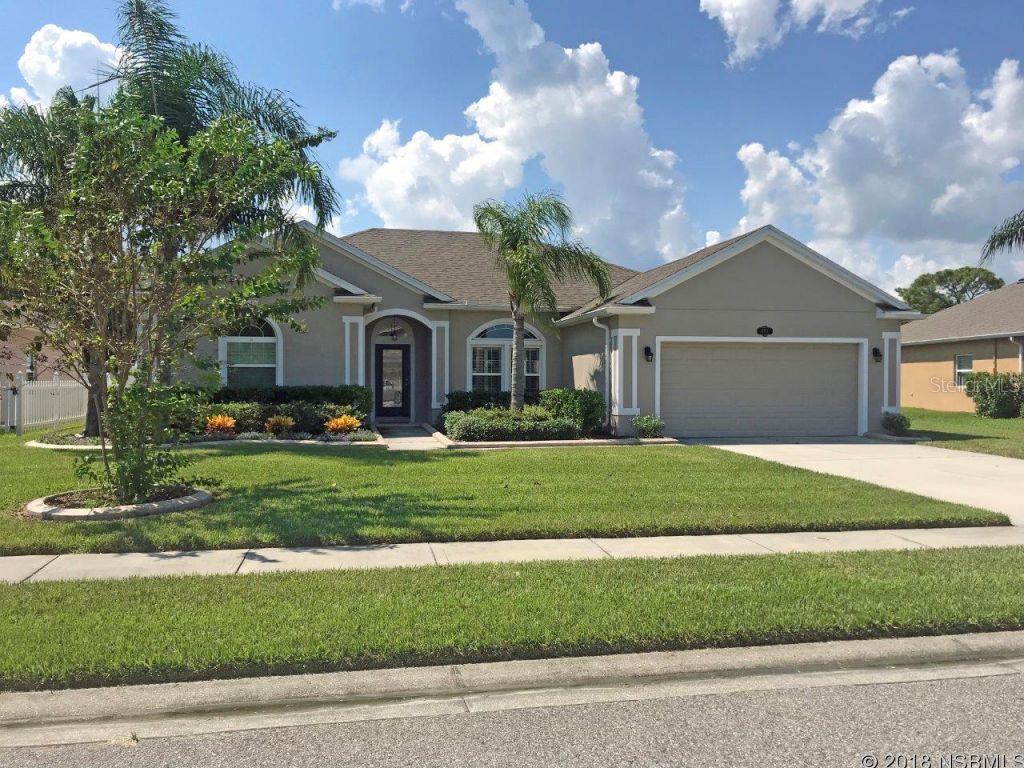 Located on quiet street near end of cul de sac, this 4 bdrm home backs up to pond in rear & the fully-fenced backyard adds considerable privacy.   Kitchen features stainless, granite, natural gas stove, double pantries & lots of counter space with breakfast bar & breakfast nook.  Master bdrm has coffered ceiling, extended master bath with double closets, double sinks & soaking tub. Open floorplan with diningroom, livingroom & family room.  Lots of upgrades including wood floors & tile, double paned windows, plantation shutters, tankless gas water heater.   Extended screened porch & room for pool.  Hookups available for either natural gas or electric dryer. ;Water: City