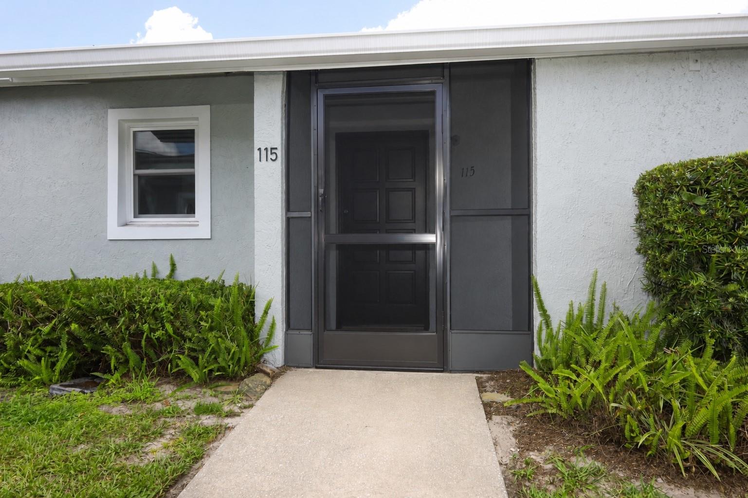 One or more photo(s) has been virtually staged. SELLER OFFERING 3% CONCESSION TO THE BUYER AT CLOSING FOR CLOSING COST CREDIT OR BUYING DOWN THE INTEREST RATE!!  ALL EXTERIOR MAINTENANCE IS COVERED BY THE HOA MAKING THIS AN AMAZING VALUE!! Welcome home to this beautifully updated 2-bedroom, 2-bath townhome offering style, comfort, and low-maintenance living. Freshly painted inside and out, this inviting home features a completely remodeled kitchen with gorgeous quartzite countertops, new cabinetry, stainless steel appliances, and ample workspace for cooking and entertaining. High-quality luxury vinyl plank flooring flows throughout the home, creating a seamless and elegant look while providing exceptional durability. Both bathrooms have been refreshed with new lighting and updated mirrors for a clean, modern feel. Enjoy your own private exterior courtyard complete with vinyl fencing and a gated entrance, providing the perfect space for relaxing, gardening, or entertaining. A front screened porch offers another peaceful outdoor retreat to enjoy the evening breeze. Additional highlights include a private full-size laundry room with washer and dryer, plus access to the community pool for year-round enjoyment. Ideally located in the popular Villas of Lake Mary, this home offers easy access to shopping, dining, I-4, and the 417 Expressway for an easy commute. With thoughtful renovations, a functional layout, and move-in-ready condition, this townhome combines modern updates with easy Florida living. Don't miss your opportunity to view this beautiful gem today!
