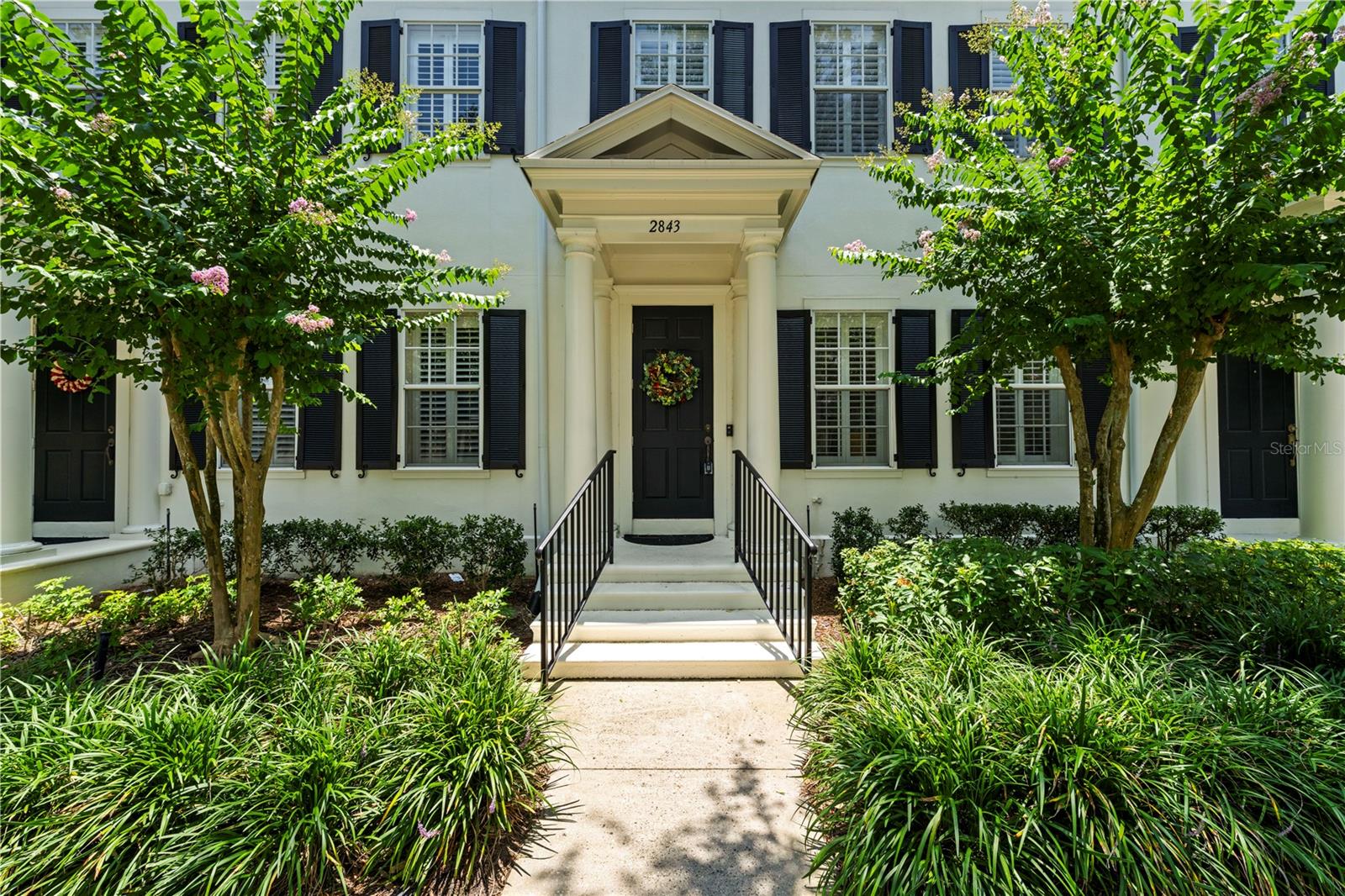 Beautifully updated 3-bedroom, 2.5-bath townhome in the highly sought-after Baldwin Park community, offering the perfect blend of style, convenience, and low-maintenance living. A private garage and welcoming front porch set the tone for this move-in-ready home. The thoughtfully designed floor plan features a formal living room at the front of the home, while the rear living spaces flow seamlessly together, creating an ideal setting for both entertaining and everyday living. The stunning remodeled kitchen is the heart of the home, showcasing stainless steel appliances, stone countertops, a large farmhouse-style sink, and abundant workspace for cooking and gathering.
Just beyond the family room, enjoy a spacious private patio that offers plenty of room for outdoor dining and relaxation without the burden of extensive yard maintenance. Upstairs, you'll find three generously sized bedrooms designed for comfort and privacy. The primary suite serves as a true retreat with a large walk-in closet, plantation shutters, and an updated en-suite bath. Additional features include luxury vinyl plank flooring, modern interior paint, plantation shutters throughout much of the home, and numerous thoughtful updates. Major improvements provide peace of mind, including a new roof (2025) and new HVAC system (2024). Ideally located within walking distance to Baldwin Park's shops, restaurants, parks, and trails, and just minutes from Winter Park, Park Avenue, downtown Orlando, and top-rated Winter Park schools. This exceptional home offers the lifestyle today's busy professionals are looking for—an unbeatable location, modern updates, and easy living.