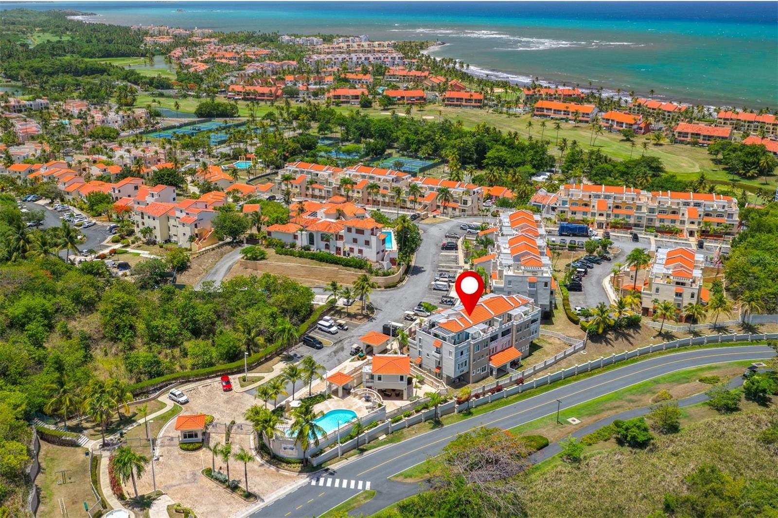 Welcome to one of the most desirable penthouse opportunities in Palmanova Village, located within the resort-style community of Palmas del Mar. This spacious 3-bedroom, 3-bathroom residence offers the perfect combination of comfort, privacy, and indoor-outdoor Caribbean living.
Designed to maximize natural light and breezes, the penthouse features a private balcony and an expansive rooftop terrace, both showcasing partial ocean views and providing the ideal setting for relaxing, entertaining, or enjoying beautiful sunrises and sunsets.

The thoughtfully designed floor plan includes three generously sized bedrooms and three full bathrooms, offering flexibility for full-time living, vacation use, or investment potential. Storm shutters throughout provide added peace of mind.

Residents of Palmanova Village enjoy access to exceptional amenities, including a community swimming pool, fitness center, and sauna, all conveniently located in the heart of Palmas del Mar. Just minutes away are beaches, golf courses, tennis and pickleball facilities, restaurants, marinas, schools, and miles of walking and golf cart paths.

Whether you're looking for a primary residence, vacation getaway, or investment property, this penthouse presents a special opportunity to own a piece of paradise in one of Puerto Rico's premier resort communities.

Palmas Del Mar HOA: $1,300/y
Palmanova HOA: $370