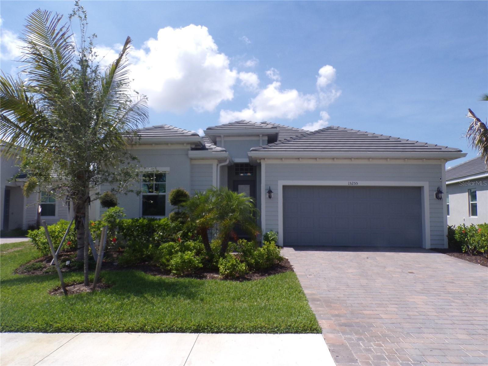 IMMACULATE - ANNUAL UNFURNISHED 3-bedroom PLUS den, 3 FULL bathroom MARIA FLOOR PLAN Home in the RESORT style community of Heritage Landing. LIGHT BRIGHT AND SPACIOUS floorplan flows effortlessly drifting between the kitchen, living room, and lanai with sliding glass doors that open up to the spectacular outdoor kitchen and poolside oasis. The open kitchen features shaker cabinets, granite counters, stainless steel appliances and a walk-in pantry. Enjoy your private HEATED POOL AND SPA with relaxing lake views. The CUSTOM OUTDOOR KITCHEN is perfect for poolside parties, grilling and entertaining. Primary bedroom has sliders out to pool as well as dual closets and vanity PLUS an oversized walk in shower. Heritage Landing features every amenity you could ask for - pickleball, tennis, state of the art gym, golf course, bocci, on site dining and tike bars not to mention the heart of the community - THE OUTSTANDING pool with tike bar and live music, club house, gym, spa the list goes on and on! DON'T miss this hassle free living - pool and lawncare included!