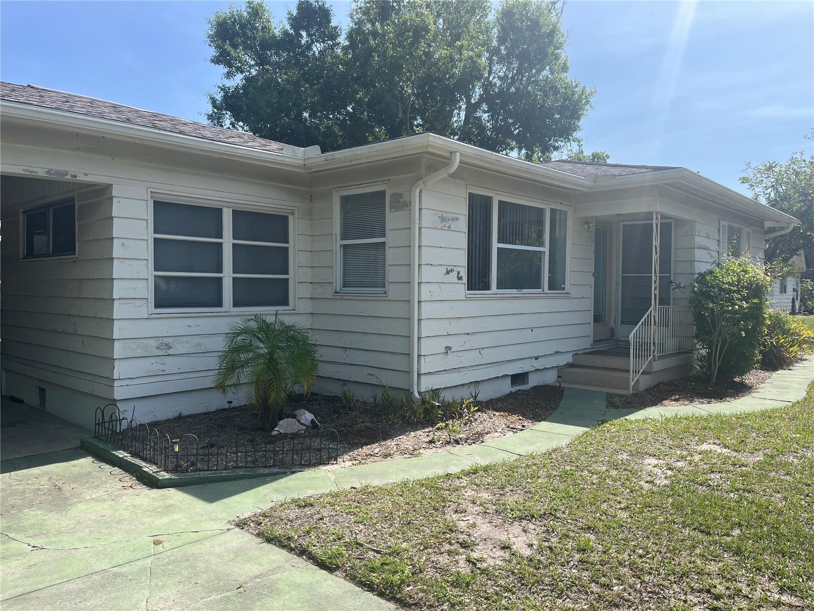 Charming 1950s Florida Ranch-Style Duplex in Sought-After Terrace Gardens!   Don't miss this rare opportunity to own a classic mid-century Florida ranch home, smartly divided into two separate units in the desirable Terrace Gardens community. Situated on an expansive corner lot, this property offers flexibility, income potential, and future development possibilities.  Unit 2415 features 2 bedrooms and 1 bath, while Unit 2417 offers 1 bedroom and 1 bath—both currently rented. Inside, you'll find original wood floors in the bedrooms, generously sized closets, and a delightful lanai-style sitting room perfect for relaxing.
Whether you're looking to generate rental income right away or dreaming of building your own custom home in a growing neighborhood filled with new construction, this property offers many options. Enjoy the lifestyle that comes with this prime location: bike the nearby Legacy Trail, explore downtown’s vibrant restaurants and cultural scene, play at Payne Park, or spend the day at the beach—all just minutes away.