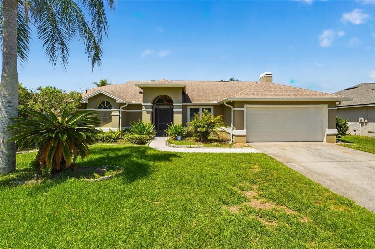 Virtually Staged. Move-in ready pool home in Wedgefield, offering 4 bedrooms and 2 baths across 2,017 square feet on a 10,491 square foot corner lot. Vaulted ceilings and a bright, open layout welcome you in, with wood-look flooring and plantation shutters throughout. The kitchen features granite counters, a breakfast bar, and a window over the sink looking out to the backyard. The family room offers skylights, and vaulted ceilings, while a flexible bonus room offers space for a home office, gym, or playroom. The primary bath has been beautifully renovated with a marble-finished walk-in shower, dual vanity, and modern fixtures. Step outside to a screened, covered patio overlooking the fenced in-ground pool, perfect for relaxing or entertaining.

Located in the desirable Wedgefield community, known for its tree-lined streets, spacious lots, and laid-back, country feel just minutes from city conveniences. Residents enjoy nearby Wedgefield Park with a playground and pickleball courts, the 18-hole Wedgefield Golf Club, and the Hal Scott Regional Preserve, offering thousands of acres of hiking, biking, and horseback riding trails. Easy access to SR 528 and SR 520 puts you minutes from Orlando International Airport, downtown Orlando, Waterford Lakes shopping and dining, and about 45 minutes from Cocoa Beach and Cape Canaveral. Zoned for Wedgefield K-8 and East River High School.
