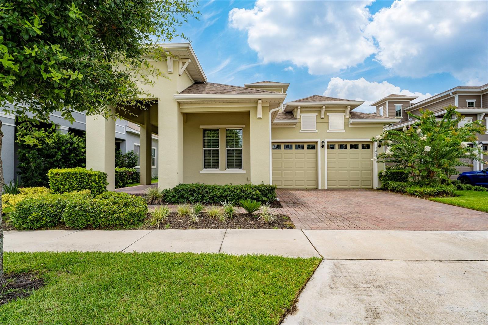 Welcome to the luxury of 7699 Bowery Dr, located within the highly desirable, master-planned Ravenna community of Horizon West. This exquisite home offers a rare combination of upscale lifestyle flexibility and long-term value. Grand 8-foot double front doors open into a towering, sun-drenched two-story foyer, setting the stage for an expansive, masterfully designed floor plan featuring 5 bedrooms, 4.5 bathrooms, and an office and over 4,000 square feet of high-end living space.

INTERIOR HIGHLIGHTS:
Designed for both grand entertaining and comfortable everyday living, the main level features a bright, seamless open-concept great room and dining area, complemented by a dedicated private office or study. At the heart of the home is a chef’s gourmet kitchen, fully anchored by 42" Cherry Slate cabinetry with crown molding, elegant quartz countertops, a drop-in cooktop, and a double wall oven. The spacious main-level primary suite serves as a true sanctuary, looking out over the garden and boasting dual walk-in closets alongside a spa-style bath with a frameless, dual-headed luxury shower.

SECOND-LEVEL FLEXIBILITY:
An oversized staircase leads to a massive second-story loft, a second primary suite, a private movie theater/media room, and two additional bedrooms. The layout is perfectly optimized as a primary residence, multi-generational retreat, or premium long-term asset. Slide open the doors from the upper loft onto a private covered balcony, offering front-row seats to breathtaking sunset water views and nightly theme park fireworks.

PEACE OF MIND & CONVENIENCE:
This property is thoughtfully upgraded with an energy-efficient solar panel system and a whole-house water filtration system, providing significant savings and exceptional modern utility. Step outside to a beautifully landscaped, oversized 0.45-acre fully fenced backyard with a covered lanai. Residents of Ravenna enjoy a walkability-focused neighborhood with a community pool, playgrounds, low HOA fees, and NO CDD.

PRIME LOCATION:
Perfectly positioned in Winter Garden, you are zoned for top-rated public schools and sit just minutes from Hamlin Town Center, premium shopping, dining, and major transport corridors including the 429, 408, and Florida’s Turnpike for a swift commute to downtown Orlando.

Schedule your private showing today and discover the ultimate Central Florida lifestyle!