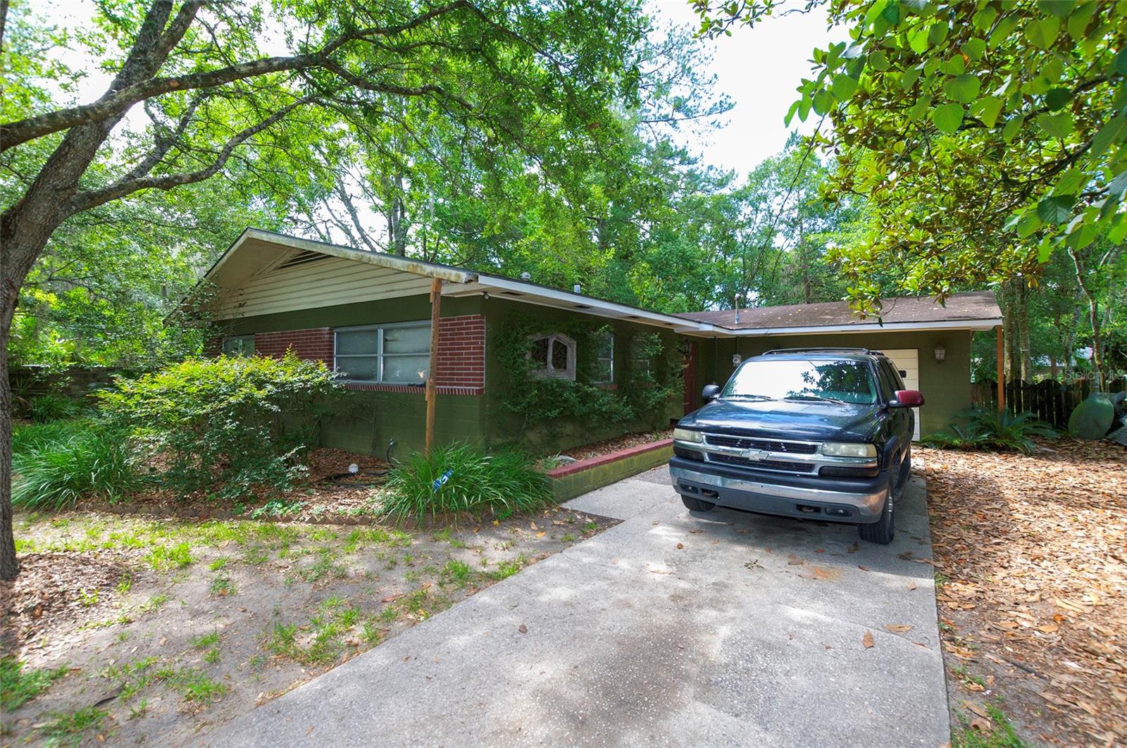 Located just minutes from the University of Florida and downtown Gainesville, This property presents an excellent investment opportunity in a highly desirable rental market. This 3-bedroom, 2-bathroom home offers a functional floor plan with spacious living areas, a dedicated dining room, an attached garage, and generously sized bedrooms. The property has been well maintained and features solid bones, making it an attractive option for investors looking for a light value-add project, long-term rental, or owner-occupant renovation. With its prime location near UF, Shands Hospital, shopping, dining, and major commuter routes, this property offers strong upside potential and long-term appreciation.