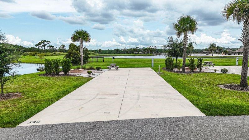 Welcome to Resort at Canopy Oaks, a gated luxury RV and tiny home community in Central Florida offering resort-style amenities and long-term ownership value. Residents enjoy a beautifully appointed clubhouse, heated pool and spa, fitness center, pickleball courts, dog park, and a vibrant social calendar — all set within meticulously maintained grounds.

Lot 398 is a one-of-a-kind corner RV lot situated on the pond, offering added privacy and peaceful water views. This premium location provides the opportunity to add a custom sun deck, creating the perfect outdoor living space. Conveniently located with easy access to the resort amenities, this lot offers both tranquility and accessibility. Bring your RV or park model and design your ideal retreat.

Ownership includes deeded property within a professionally managed resort known for strong seasonal demand and rental potential. Ask about current developer incentives, including special pricing and lot improvement opportunities.

Schedule your private tour today and secure your place in this sought-after Florida resort community.