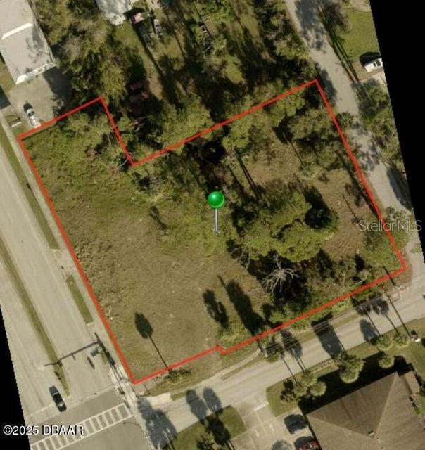 EXCELLENT SIGNALED CORNER .91 ACRE LOT at the NE Corner of US 1 and Hand Ave in Ormond Beach City Limits. B-5 Service Commercial Zoning. Previous building demolished and there may be possible impact fee credits available for Police, Fire, & Roads, and Water & Sewer. 21,388 Avg Daily Traffic Count. City Utilities on or near site include 6'' water line on US 1 and 8' sewer line within property. Permitted Uses: Adult Day Care Center, Assisted Living Facility, Business & Professional Office, Business Service, Clubs & Fraternal Organizations, Type A Convenience Store, Financial Institution, Funeral Home, Instructional Physical Activity, Medical Supply & Rental, Nursing Home, Retail Sales & Service, School, Public, Veterinarian, Business Warehouse, Storage Warehouse. All information is deemed reliable but not guaranteed and should be independently verified.