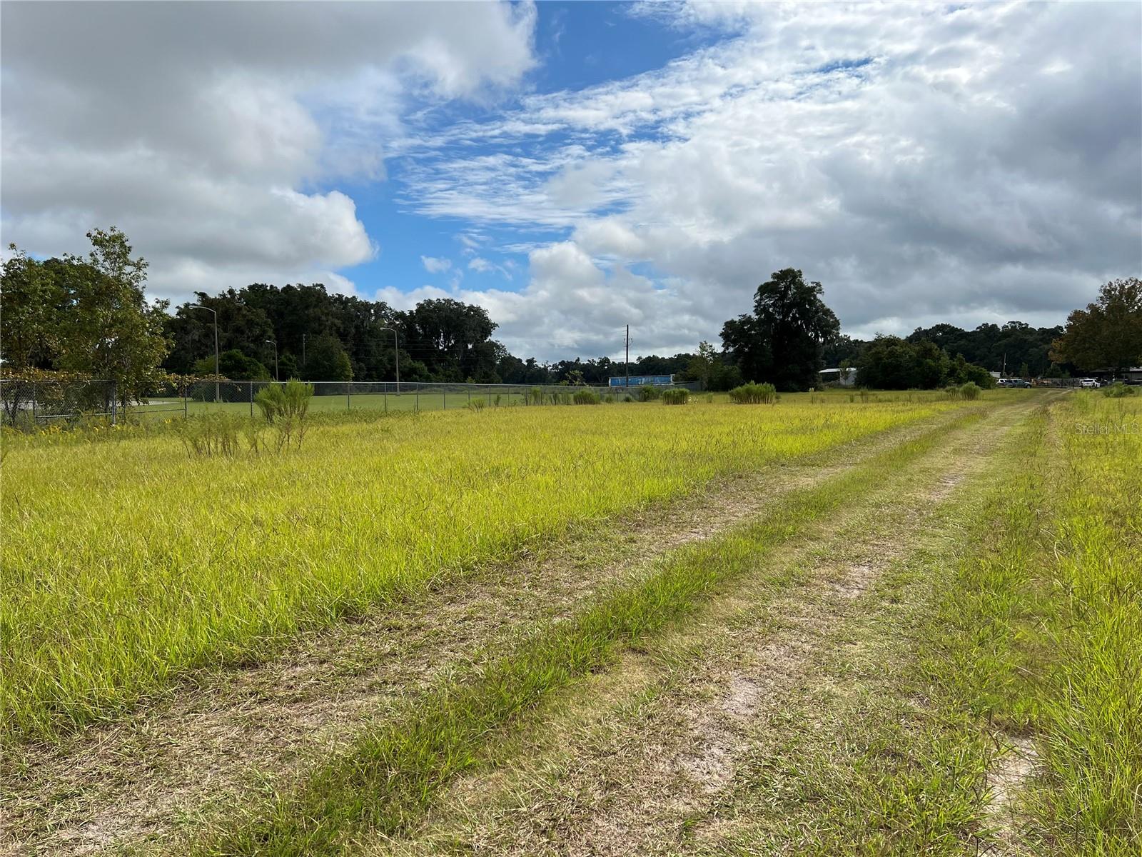 17+ acres zoned Industrial in fast growing north central Florida city of Newberry. With rail access, this is a rare parcel, valuable to industries wanting to locate in a business-friendly environment. A preliminary design has been approved to construct a railroad spur by Central Florida Railroad. Newberry is just west of Gainesville, 10 miles from I-75 and 24 miles from Gainesville Regional Airport. Newberry has a large presence of Ag related businesses and is home to the UF Institute for Agricultural Sciences campus. Surrounding Newberry are major biotech firms, natural resource mining, computer tech companies to name a few. This parcel lends itself to endless possibilities in an area where growth and development is on the rise and one with coveted rail access which makes it a jewel among the rest. The two parcels which make up the 17 acres are: 01903-001-000 and 01915-002-000.