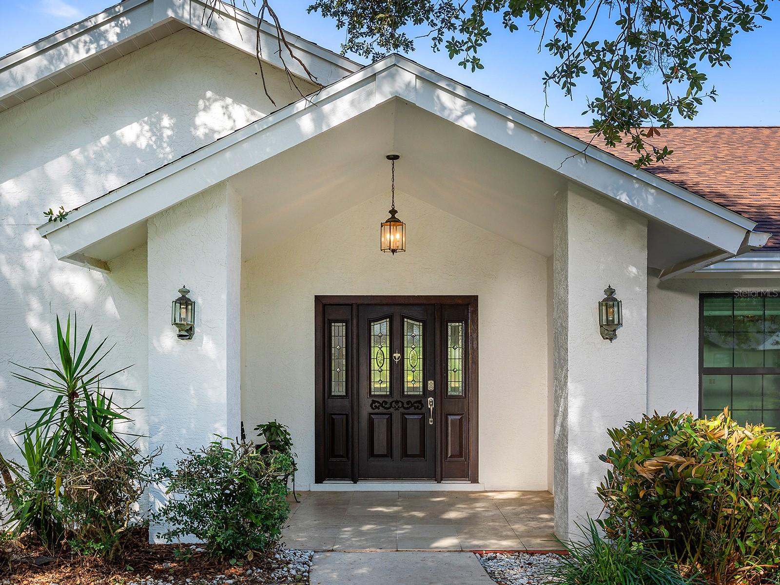 Discover the perfect blend of Location, modern convenience and comfort at 1756 Cottonwood Trail. Step inside to discover an open floor plan that spans 2195 square feet, featuring 3 spacious bedrooms and two bathrooms. The heart of the home is a beautifully renovated kitchen, equipped with stainless steel appliances and a convenient breakfast bar, ideal for both casual dining and entertaining. The dining room and office/work area add additional functionality. The living area is highlighted by cathedral ceilings and a striking fireplace/feature wall for cozy gatherings. The split plan has a large master with a walk in closet and generous shower and soaking tub. Sliding doors lead you to a large screened lanai, accessible from the primary bedroom, offering a perfect spot for relaxation and enjoying your private outdoor space and seating area in the backyard. Laundry is a breeze with an oversized laundry room, plenty of storage cabinets, and counter space. Lake Estates community amenities are second to none, featuring two sparkling pools, one of which is lakeside, tennis courts, a basketball court, and fitness center. Enjoy serene moments in the gazebo with picturesque lake views, or host gatherings in the picnic area. Schedule your tour today!