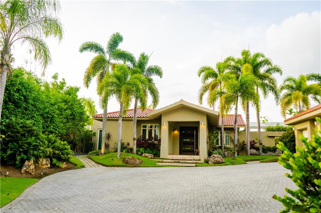 This luxurious 6,000 sq feet property has 5 bedrooms, 6.5 bathrooms, two spacious living areas, modern, fully equipped kitchen , a great terrace with a private pool, gas grill and outdoor furniture plus lounge chairs, a 4 passenger golf cart. Located within the Dorado Beach Resort, since it is a 2,000 acre natural reserve most of the communities are 1-3 miles away from the beach and Hotel. This being said, the entire resort is interconnected via golf cart trails, meaning that you can have easy access (walking or in golf cart) to the different communities and amenities within this Resort. The Dorado Beach East community is private, gated, family friendly and offers a wide range of facilities that you can enjoy at no additional cost. The facilities include scenic pools, clay tennis courts, basketball and beach volleyball courts, a basic gym, a game room, a 3-par golf course that winds through the neighborhood, and an aviation themed park which has a custom water park and sand park.
