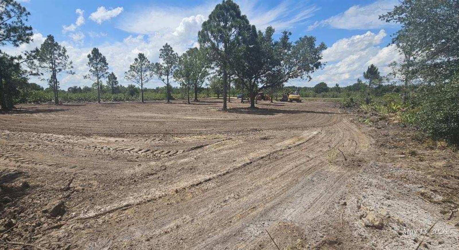 Recently cleared and ready for your vision! This beautiful property on NW 250th St was freshly cleared in April 2026, creating a clean and build-ready homesite while still preserving several mature trees for shade and character. The lot already features a culvert entry, making access easy and adding immediate value for future development.

Located in a peaceful rural area of Okeechobee County, this property offers the perfect balance of privacy, open space, and convenience. Whether you’re planning to build a custom home, bring a manufactured home, create a weekend retreat, or invest in Florida land, this property provides endless possibilities with plenty of room for additional structures, outdoor living, recreational vehicles, animals, gardens, or a workshop.

Surrounded by natural beauty and large parcels, enjoy quiet country living with wide-open skies and a relaxing atmosphere while still being within driving distance to town, shopping, dining, and outdoor recreation. Nearby properties continue to develop, making this an excellent opportunity for both personal use and long-term investment.

The hard work has already begun — the lot has been cleared, access improved with a culvert, and the property is ready for its next owner to bring their plans to life. No HOA. Well and septic will be needed. Drive by today and see the potential for yourself!