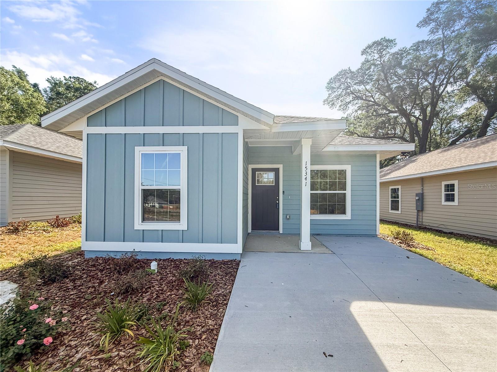 3-bedroom, 2-bath new construction home in Alachua, FL featuring a light and airy interior design. Offering approximately 1,243 heated square feet, this home provides an open living space with a clean, modern finish throughout.

The kitchen and bathrooms include quartz countertops and wood cabinetry, complemented by luxury vinyl plank flooring throughout the home. The layout places two bedrooms and a shared bathroom toward the front, with the primary bedroom located toward the back for added privacy. The primary bathroom features a walk-in shower.

Additional features include updated fixtures, a covered front entry, and a Ring doorbell. Convenient location with quick access to I-75 and nearby Gainesville. Listing agent has ownership interest.