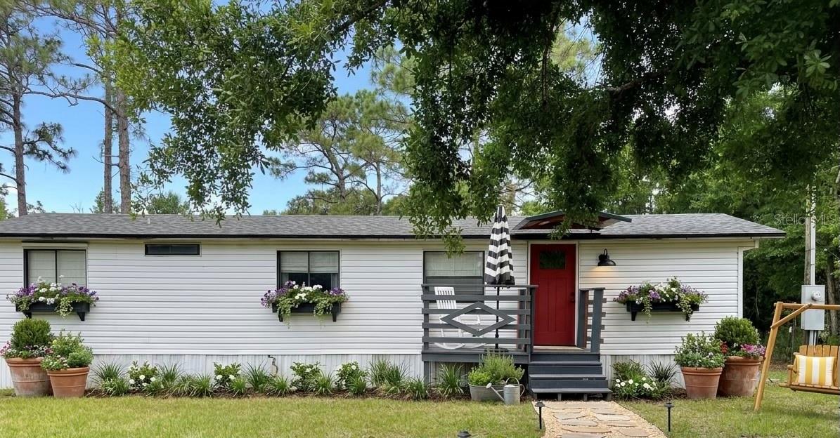 Beautifully maintained 2-bedroom, 1-bath home on nearly 1 acre with NO HOA and NO flood zone! This move-in-ready property features a new roof (2023), a functional layout, and an impressive 18x27 metal workshop perfect for storage, hobbies, or a home business. Conveniently located near St. Cloud and Melbourne, with easy access to shopping, dining, schools, major highways, Orlando International Airport, and Florida’s beautiful beaches. Enjoy the space, privacy, and flexibility of country living with modern convenience just minutes away. DON'T MISSED THIS OPPORTUNITY !!!